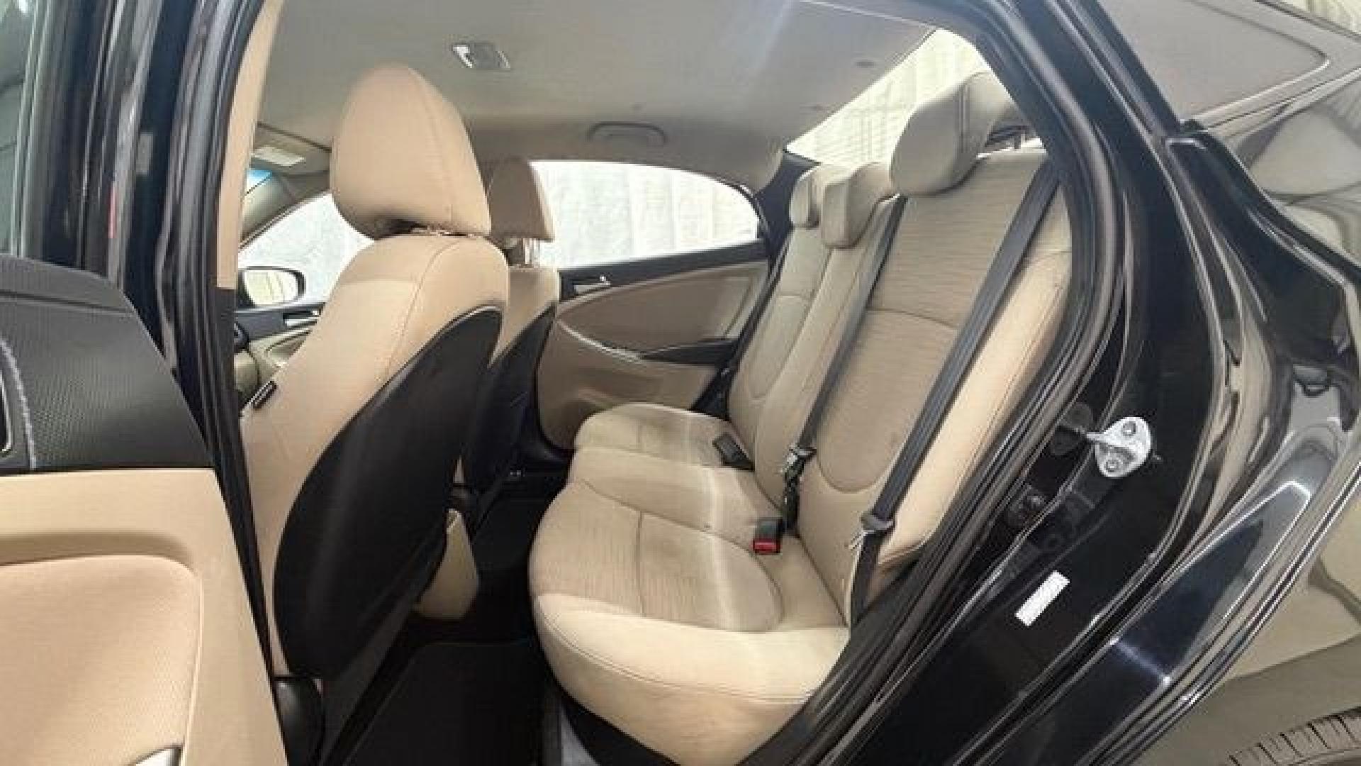 2017 Black Hyundai Accent SE 4-Door 6A (KMHCT4AE7HU) with an 1.6L L4 DOHC 16V engine, 6-Speed Automatic transmission, located at 1806 Veterans Memorial Hwy SW, Austell, GA, 30168, (770) 944-9558, 33.817959, -84.606987- Photo#14