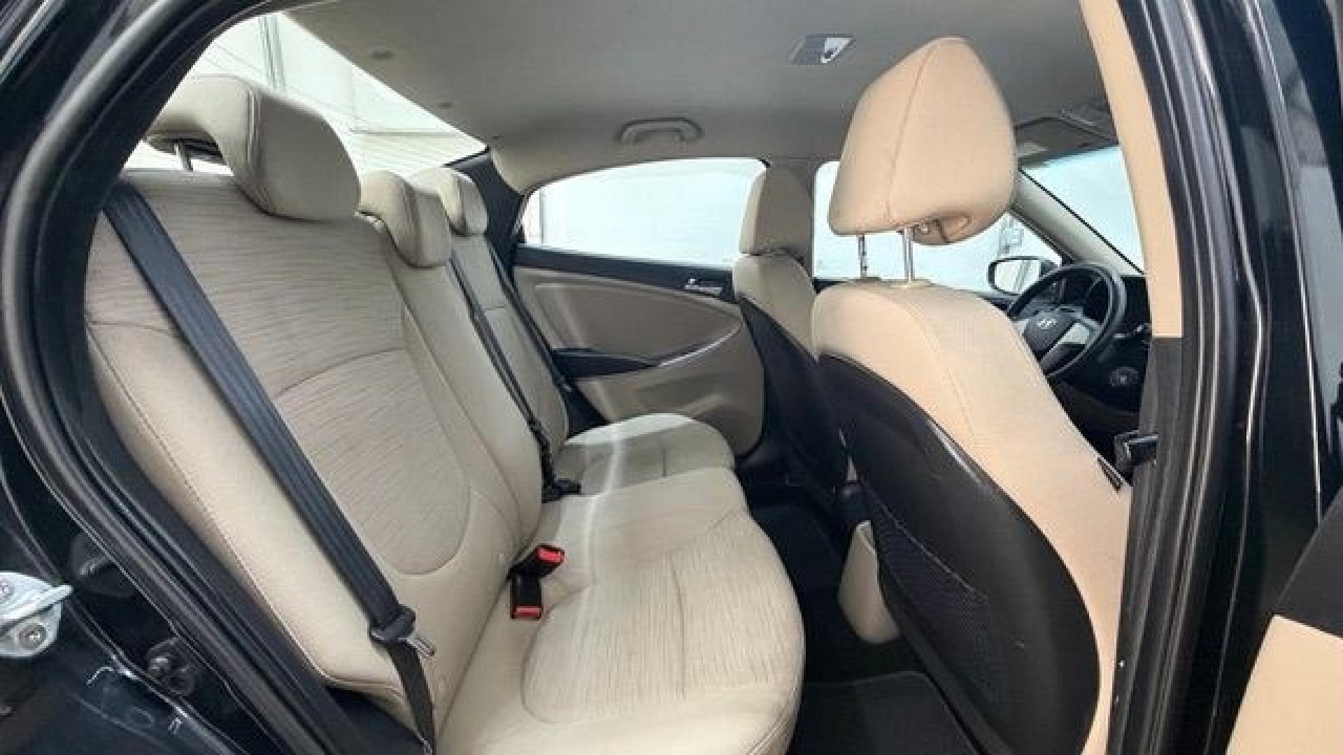 2017 Black Hyundai Accent SE 4-Door 6A (KMHCT4AE7HU) with an 1.6L L4 DOHC 16V engine, 6-Speed Automatic transmission, located at 1806 Veterans Memorial Hwy SW, Austell, GA, 30168, (770) 944-9558, 33.817959, -84.606987- Photo#17