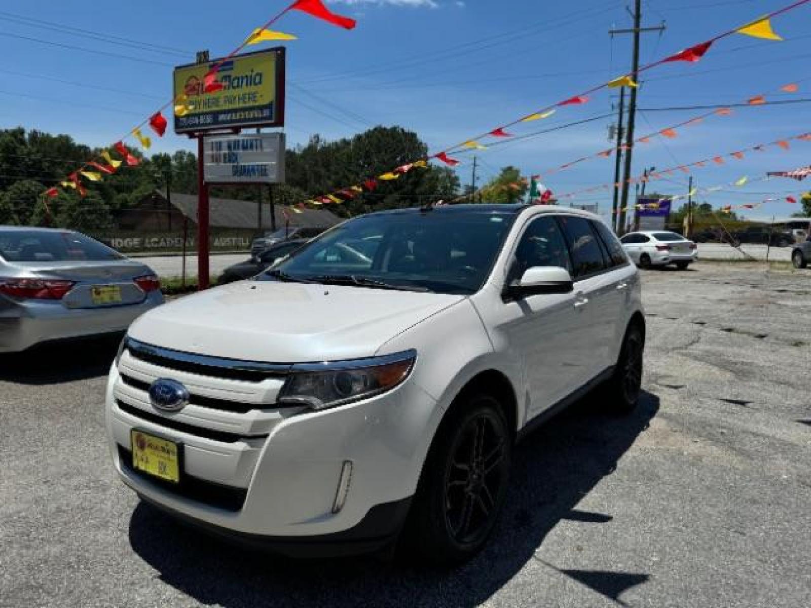 2013 White Ford Edge SEL FWD (2FMDK3JC7DB) with an 3.5L V6 DOHC 24V engine, 6-Speed Automatic transmission, located at 1806 Veterans Memorial Hwy SW, Austell, GA, 30168, (770) 944-9558, 33.817959, -84.606987 - Photo #0