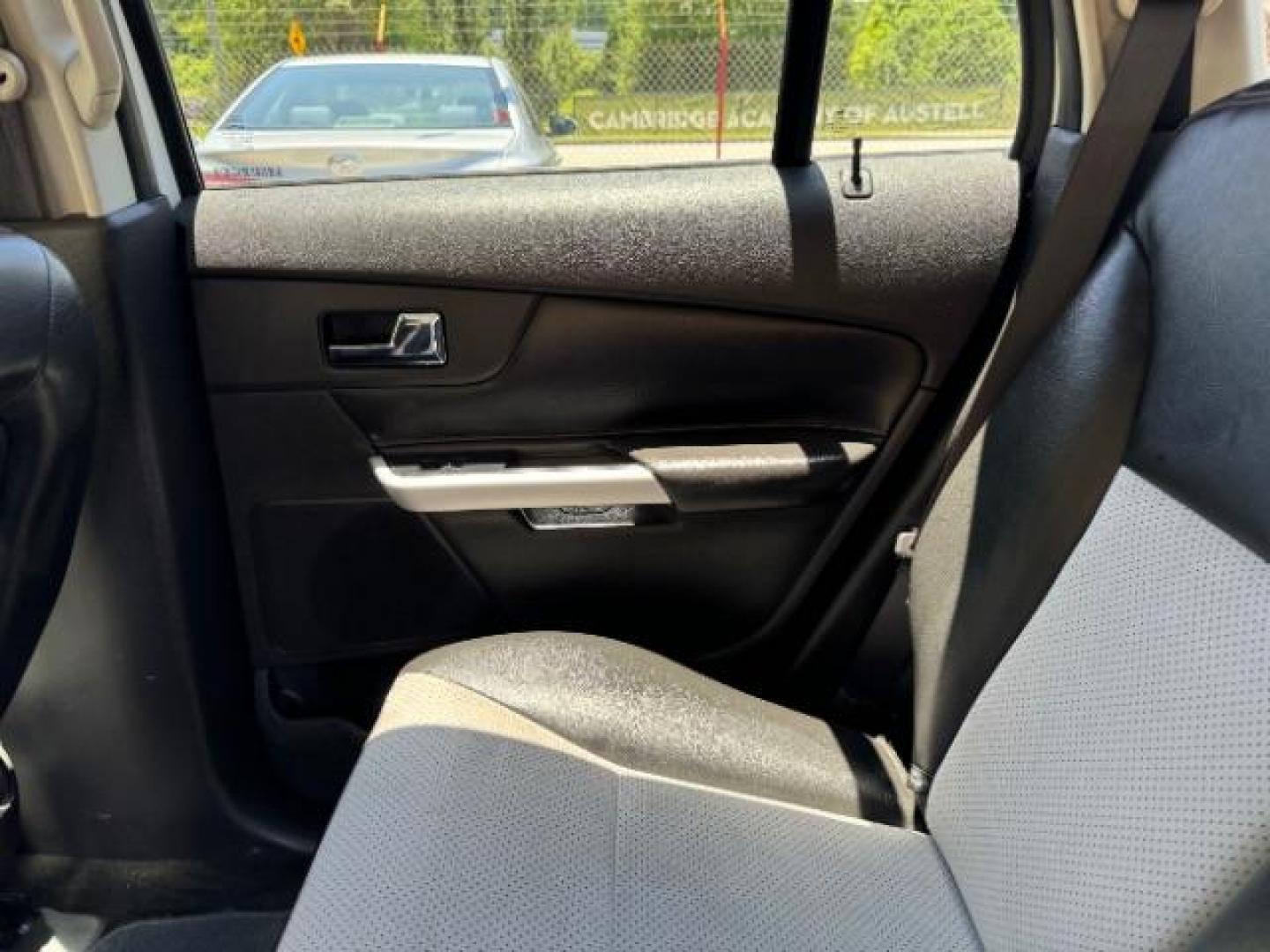 2013 White Ford Edge SEL FWD (2FMDK3JC7DB) with an 3.5L V6 DOHC 24V engine, 6-Speed Automatic transmission, located at 1806 Veterans Memorial Hwy SW, Austell, GA, 30168, (770) 944-9558, 33.817959, -84.606987 - Photo#12