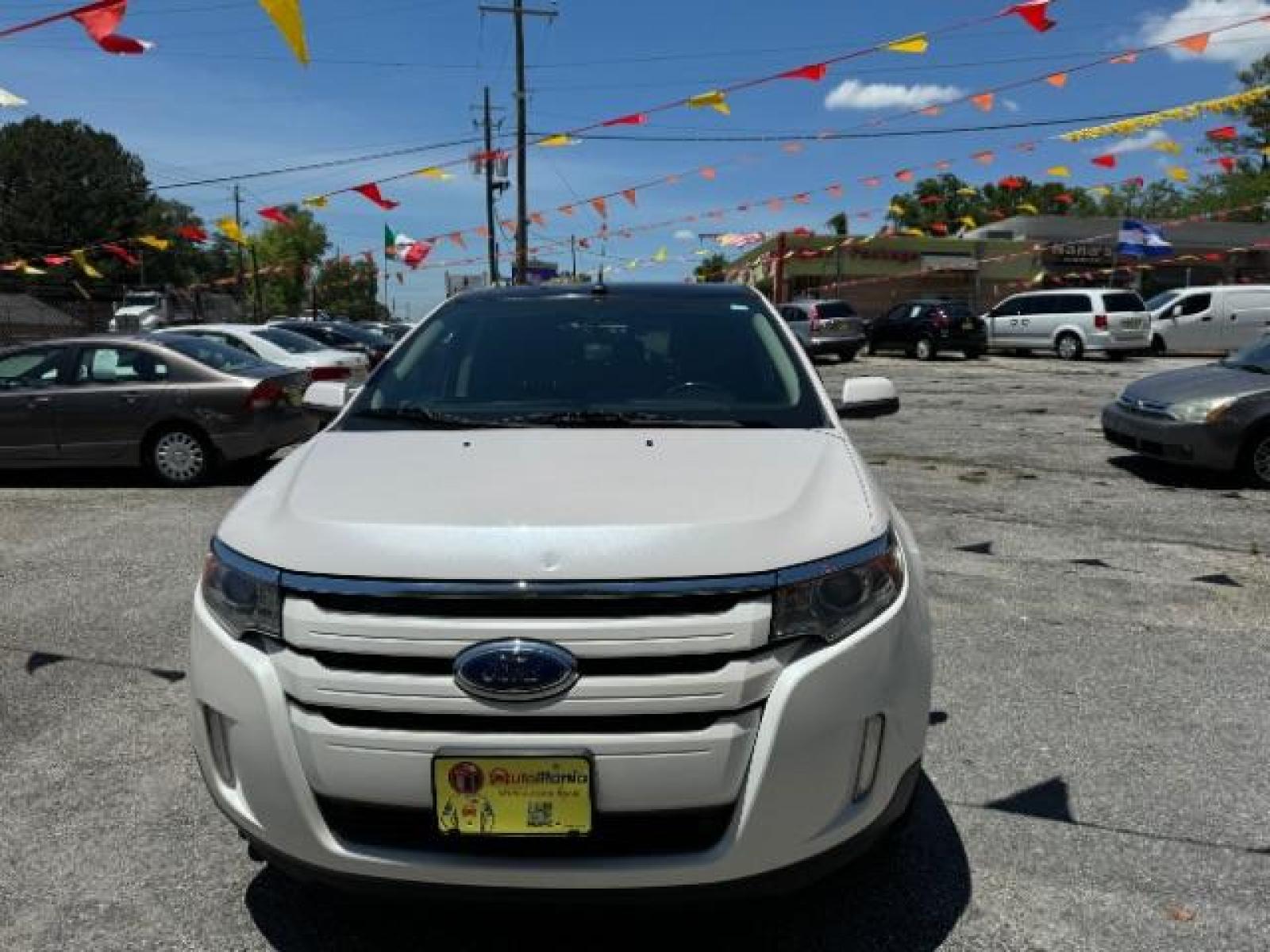 2013 White Ford Edge SEL FWD (2FMDK3JC7DB) with an 3.5L V6 DOHC 24V engine, 6-Speed Automatic transmission, located at 1806 Veterans Memorial Hwy SW, Austell, GA, 30168, (770) 944-9558, 33.817959, -84.606987 - Photo #1