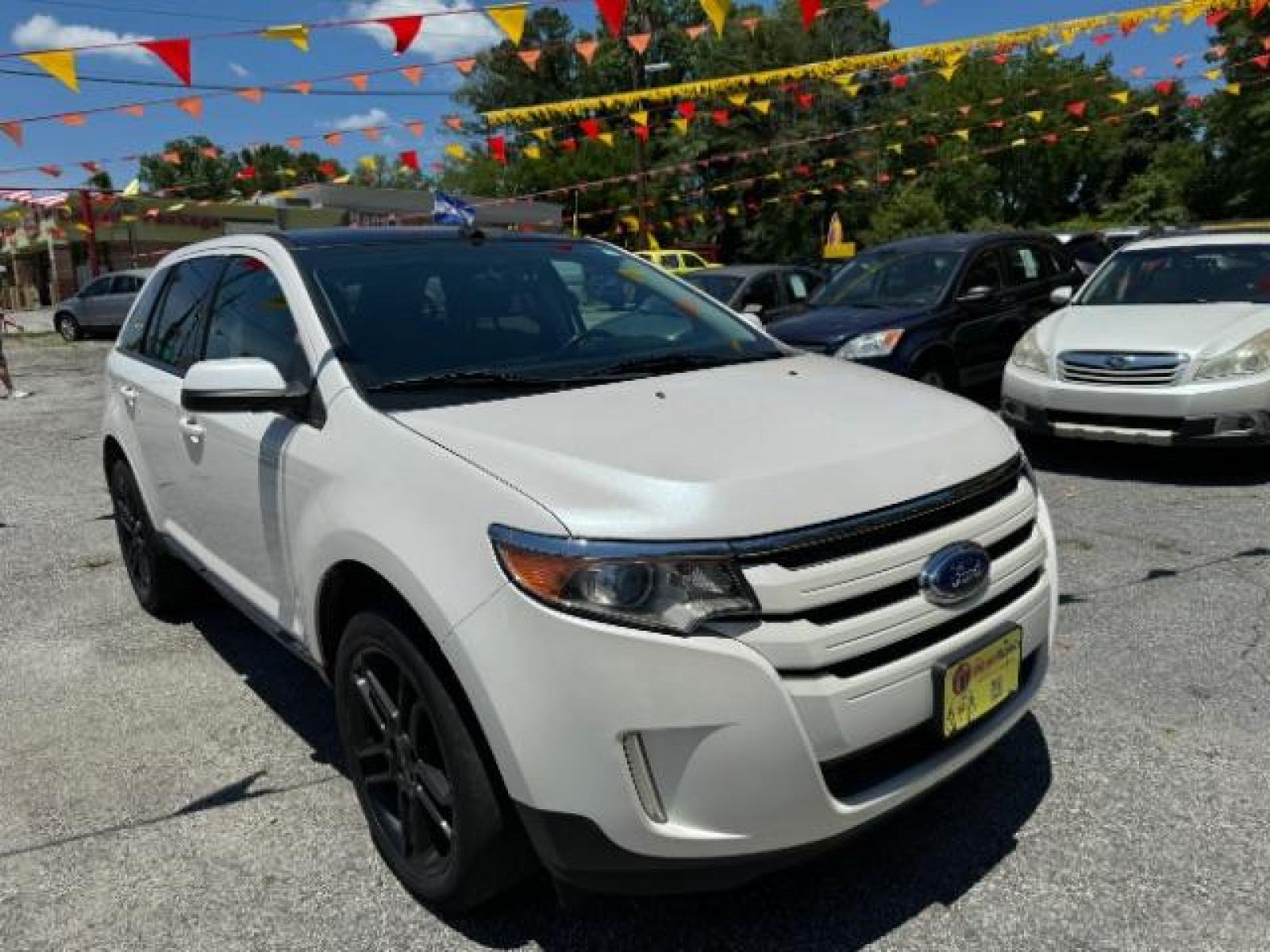 2013 White Ford Edge SEL FWD (2FMDK3JC7DB) with an 3.5L V6 DOHC 24V engine, 6-Speed Automatic transmission, located at 1806 Veterans Memorial Hwy SW, Austell, GA, 30168, (770) 944-9558, 33.817959, -84.606987 - Photo #2