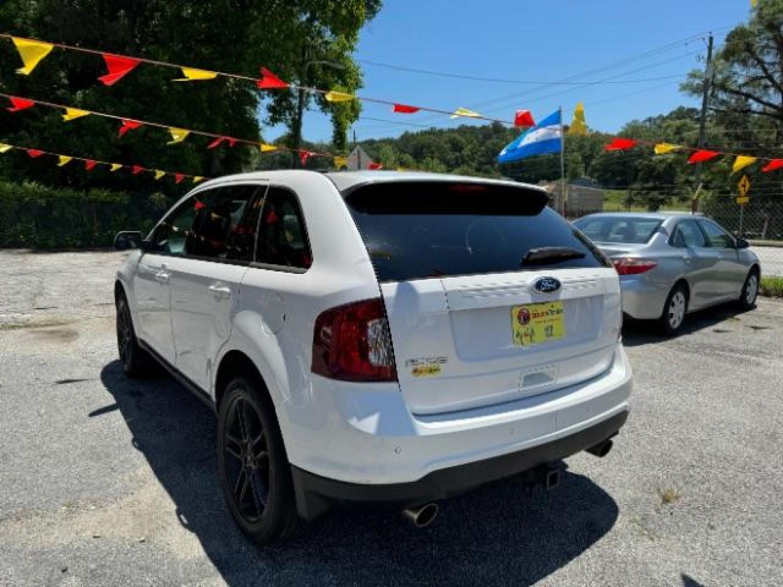 2013 White Ford Edge SEL FWD (2FMDK3JC7DB) with an 3.5L V6 DOHC 24V engine, 6-Speed Automatic transmission, located at 1806 Veterans Memorial Hwy SW, Austell, GA, 30168, (770) 944-9558, 33.817959, -84.606987 - Photo #5