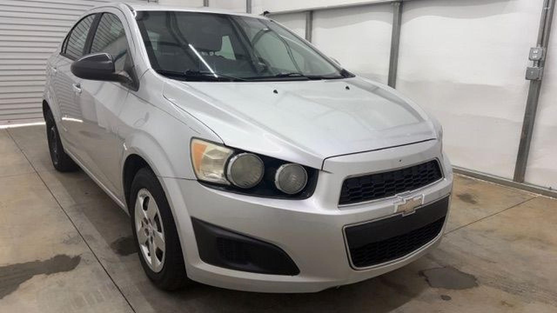2015 Silver Chevrolet Sonic LS Auto Sedan (1G1JA5SH0F4) with an 1.8L L4 DOHC 24V engine, 6-Speed Automatic transmission, located at 1806 Veterans Memorial Hwy SW, Austell, GA, 30168, (770) 944-9558, 33.817959, -84.606987 - Photo#8