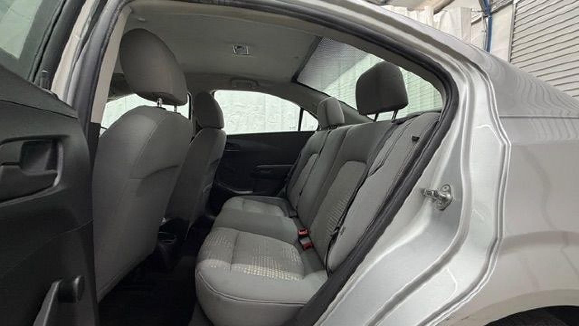 2015 Silver Chevrolet Sonic LS Auto Sedan (1G1JA5SH0F4) with an 1.8L L4 DOHC 24V engine, 6-Speed Automatic transmission, located at 1806 Veterans Memorial Hwy SW, Austell, GA, 30168, (770) 944-9558, 33.817959, -84.606987 - Photo#14