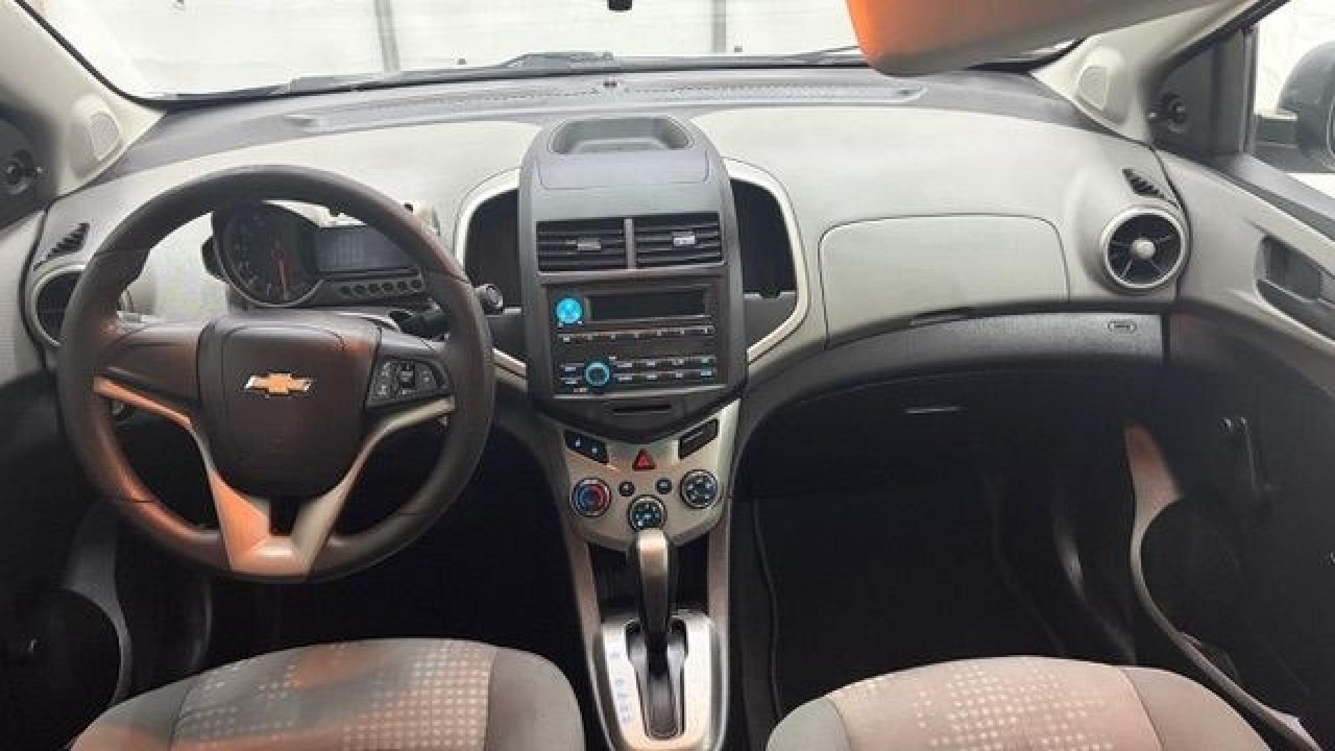 2015 Silver Chevrolet Sonic LS Auto Sedan (1G1JA5SH0F4) with an 1.8L L4 DOHC 24V engine, 6-Speed Automatic transmission, located at 1806 Veterans Memorial Hwy SW, Austell, GA, 30168, (770) 944-9558, 33.817959, -84.606987 - Photo#15