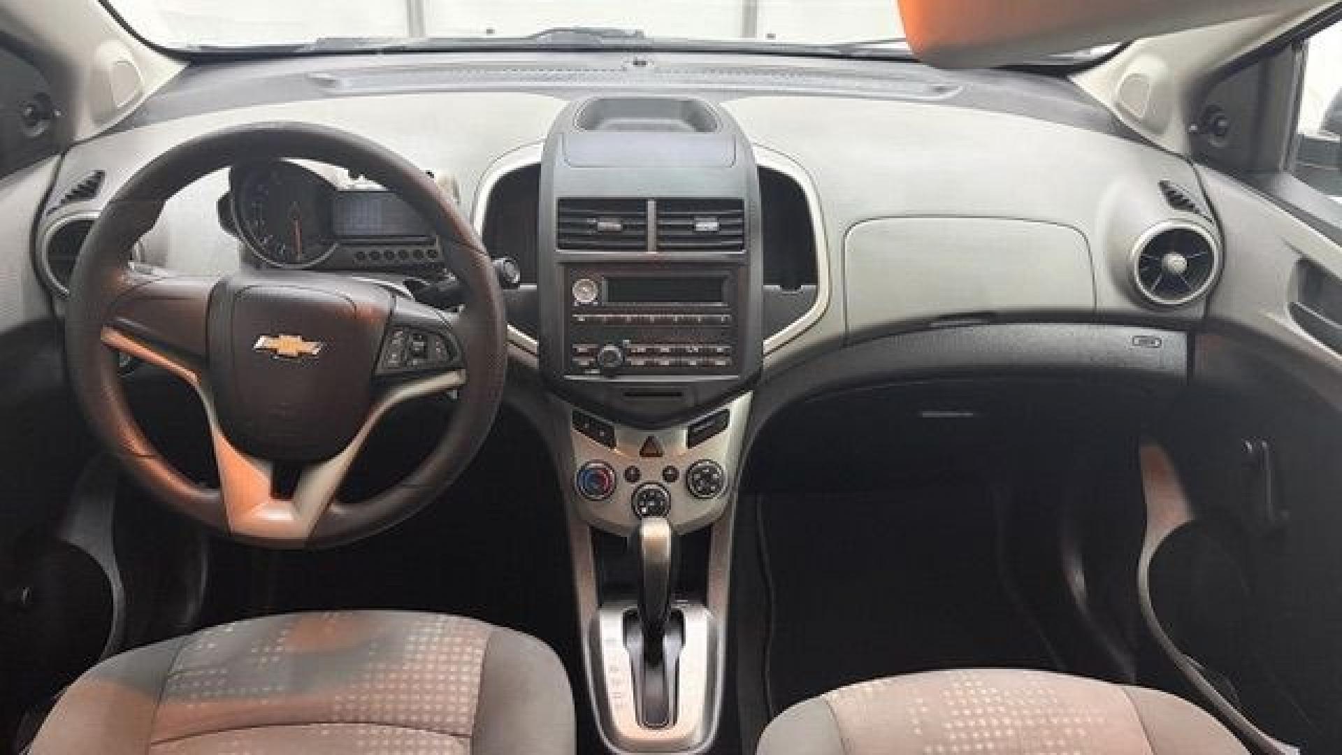 2015 Silver Chevrolet Sonic LS Auto Sedan (1G1JA5SH0F4) with an 1.8L L4 DOHC 24V engine, 6-Speed Automatic transmission, located at 1806 Veterans Memorial Hwy SW, Austell, GA, 30168, (770) 944-9558, 33.817959, -84.606987 - Photo#16