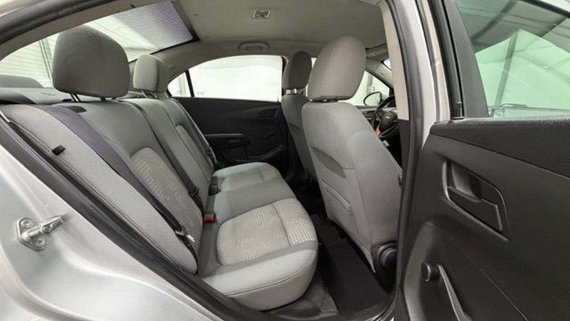 2015 Silver Chevrolet Sonic LS Auto Sedan (1G1JA5SH0F4) with an 1.8L L4 DOHC 24V engine, 6-Speed Automatic transmission, located at 1806 Veterans Memorial Hwy SW, Austell, GA, 30168, (770) 944-9558, 33.817959, -84.606987 - Photo#17