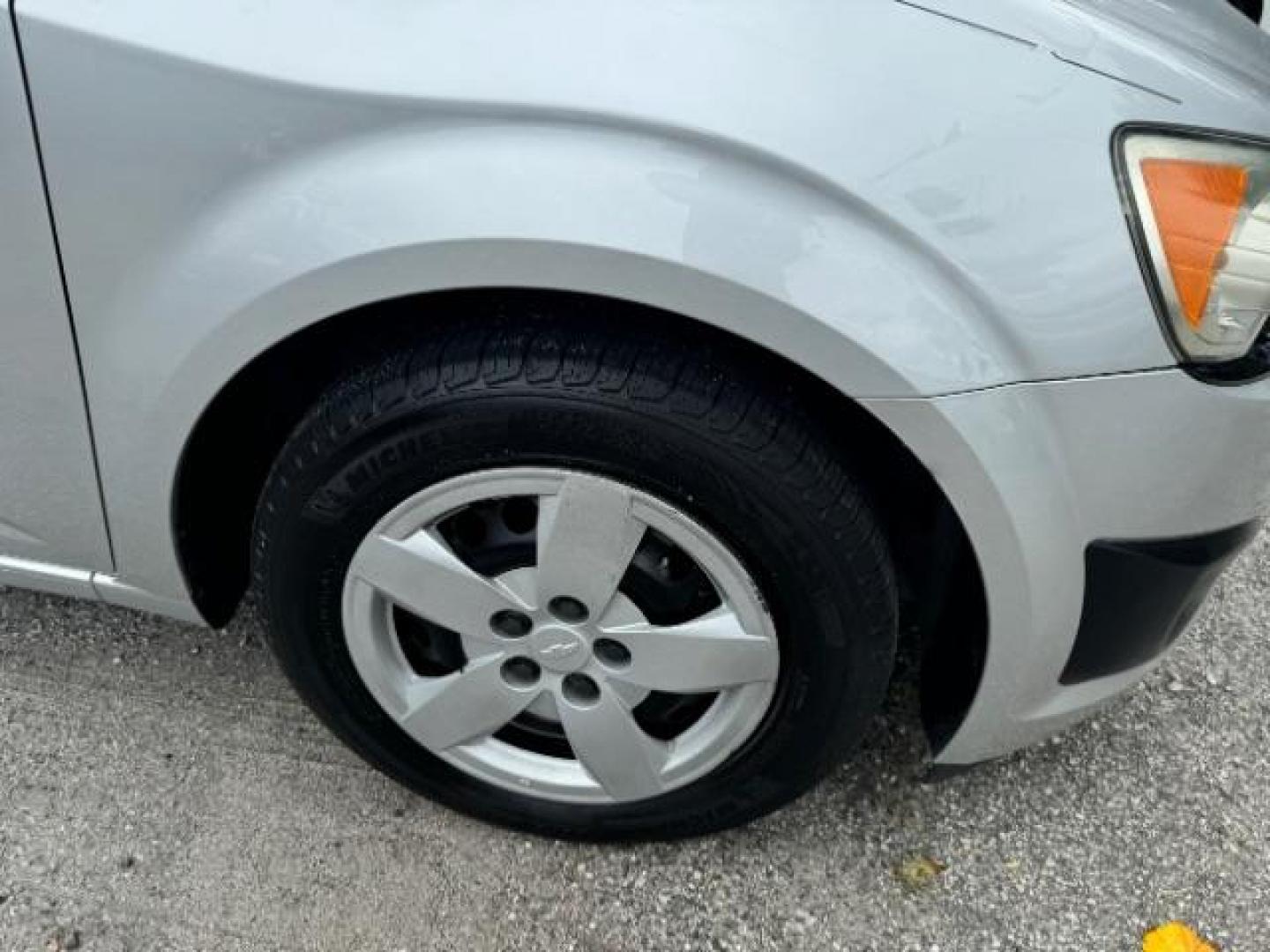 2015 Silver Chevrolet Sonic LS Auto Sedan (1G1JA5SH0F4) with an 1.8L L4 DOHC 24V engine, 6-Speed Automatic transmission, located at 1806 Veterans Memorial Hwy SW, Austell, GA, 30168, (770) 944-9558, 33.817959, -84.606987 - Photo#16