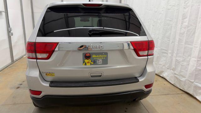 2012 Silver Jeep Grand Cherokee Laredo 2WD (1C4RJEAG6CC) with an 3.6L V6 DOHC 24V engine, 5-Speed Automatic transmission, located at 1806 Veterans Memorial Hwy SW, Austell, GA, 30168, (770) 944-9558, 33.817959, -84.606987 - Photo#4