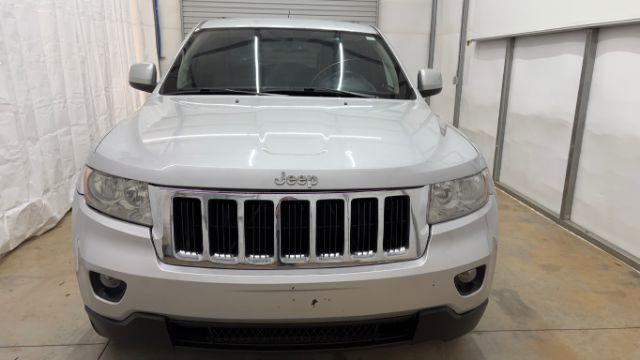 2012 Silver Jeep Grand Cherokee Laredo 2WD (1C4RJEAG6CC) with an 3.6L V6 DOHC 24V engine, 5-Speed Automatic transmission, located at 1806 Veterans Memorial Hwy SW, Austell, GA, 30168, (770) 944-9558, 33.817959, -84.606987 - Photo#8