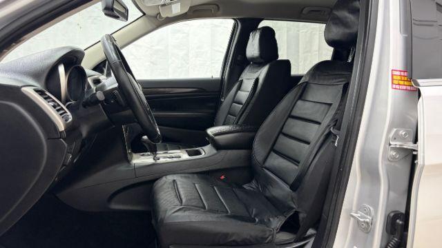 2012 Silver Jeep Grand Cherokee Laredo 2WD (1C4RJEAG6CC) with an 3.6L V6 DOHC 24V engine, 5-Speed Automatic transmission, located at 1806 Veterans Memorial Hwy SW, Austell, GA, 30168, (770) 944-9558, 33.817959, -84.606987 - Photo#10