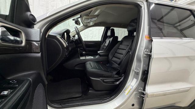 2012 Silver Jeep Grand Cherokee Laredo 2WD (1C4RJEAG6CC) with an 3.6L V6 DOHC 24V engine, 5-Speed Automatic transmission, located at 1806 Veterans Memorial Hwy SW, Austell, GA, 30168, (770) 944-9558, 33.817959, -84.606987 - Photo#11