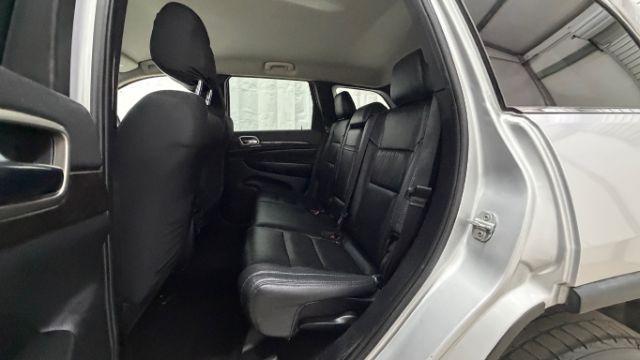 2012 Silver Jeep Grand Cherokee Laredo 2WD (1C4RJEAG6CC) with an 3.6L V6 DOHC 24V engine, 5-Speed Automatic transmission, located at 1806 Veterans Memorial Hwy SW, Austell, GA, 30168, (770) 944-9558, 33.817959, -84.606987 - Photo#13