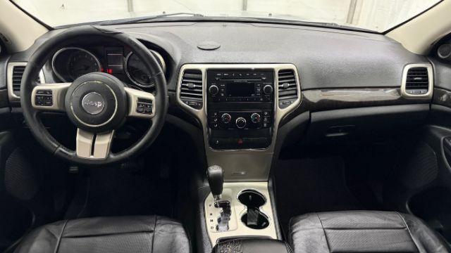 2012 Silver Jeep Grand Cherokee Laredo 2WD (1C4RJEAG6CC) with an 3.6L V6 DOHC 24V engine, 5-Speed Automatic transmission, located at 1806 Veterans Memorial Hwy SW, Austell, GA, 30168, (770) 944-9558, 33.817959, -84.606987 - Photo#14