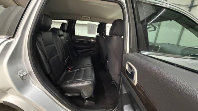 2012 Silver Jeep Grand Cherokee Laredo 2WD (1C4RJEAG6CC) with an 3.6L V6 DOHC 24V engine, 5-Speed Automatic transmission, located at 1806 Veterans Memorial Hwy SW, Austell, GA, 30168, (770) 944-9558, 33.817959, -84.606987 - Photo#16