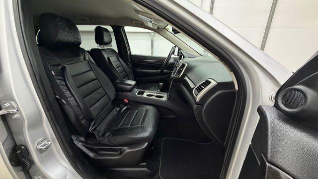 2012 Silver Jeep Grand Cherokee Laredo 2WD (1C4RJEAG6CC) with an 3.6L V6 DOHC 24V engine, 5-Speed Automatic transmission, located at 1806 Veterans Memorial Hwy SW, Austell, GA, 30168, (770) 944-9558, 33.817959, -84.606987 - Photo#17