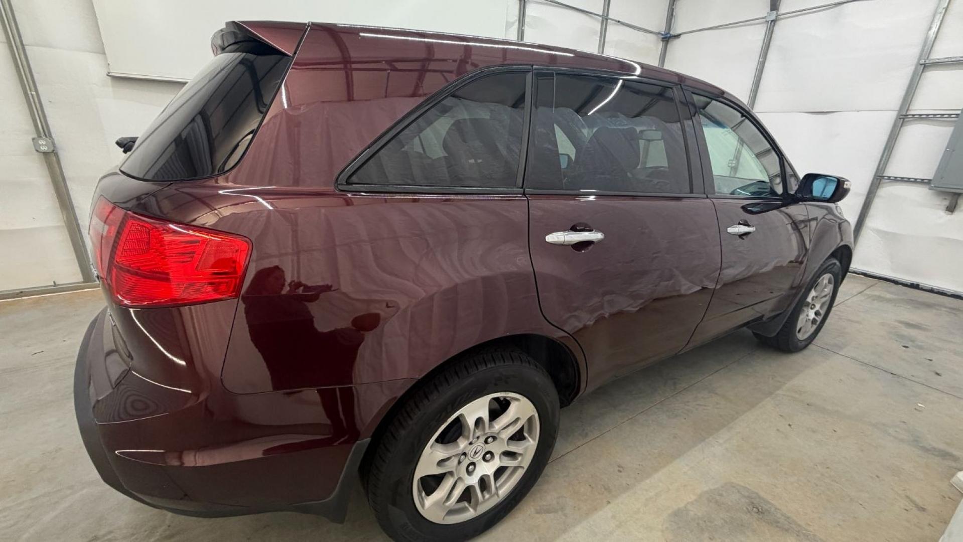 2009 Maroon Acura MDX Base (2HNYD282X9H) with an 3.7L V6 SOHC 24V engine, 5-Speed Automatic transmission, located at 1806 Veterans Memorial Hwy SW, Austell, GA, 30168, (770) 944-9558, 33.817959, -84.606987- Photo#6