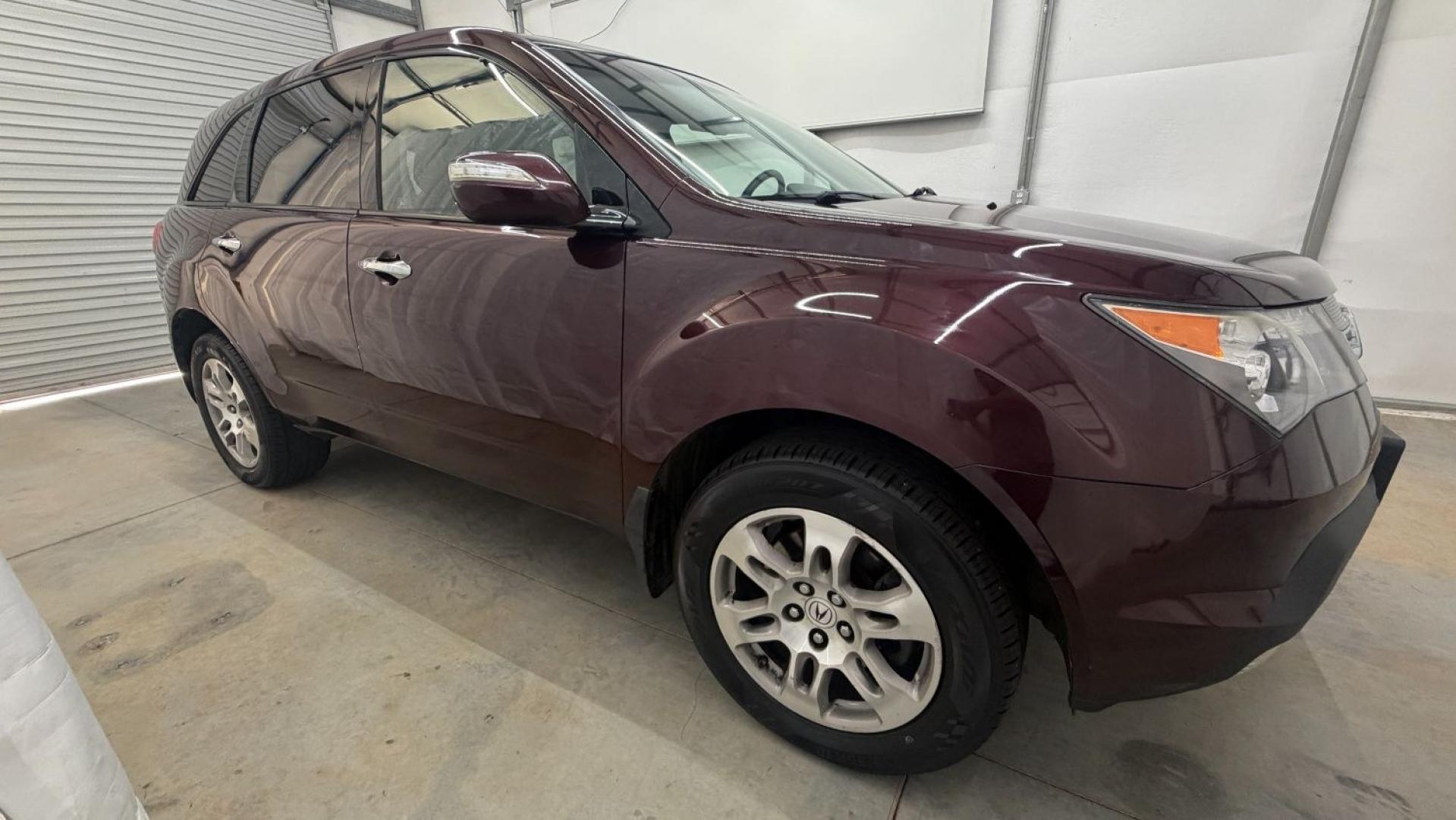 2009 Maroon Acura MDX Base (2HNYD282X9H) with an 3.7L V6 SOHC 24V engine, 5-Speed Automatic transmission, located at 1806 Veterans Memorial Hwy SW, Austell, GA, 30168, (770) 944-9558, 33.817959, -84.606987- Photo#7