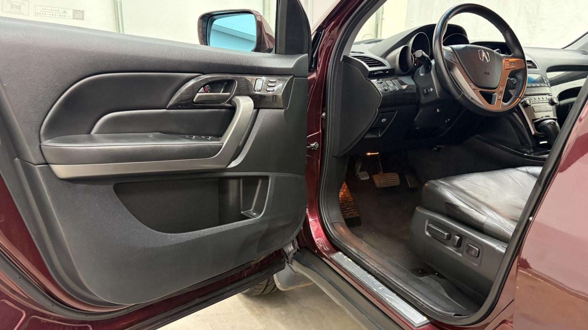 2009 Maroon Acura MDX Base (2HNYD282X9H) with an 3.7L V6 SOHC 24V engine, 5-Speed Automatic transmission, located at 1806 Veterans Memorial Hwy SW, Austell, GA, 30168, (770) 944-9558, 33.817959, -84.606987- Photo#10