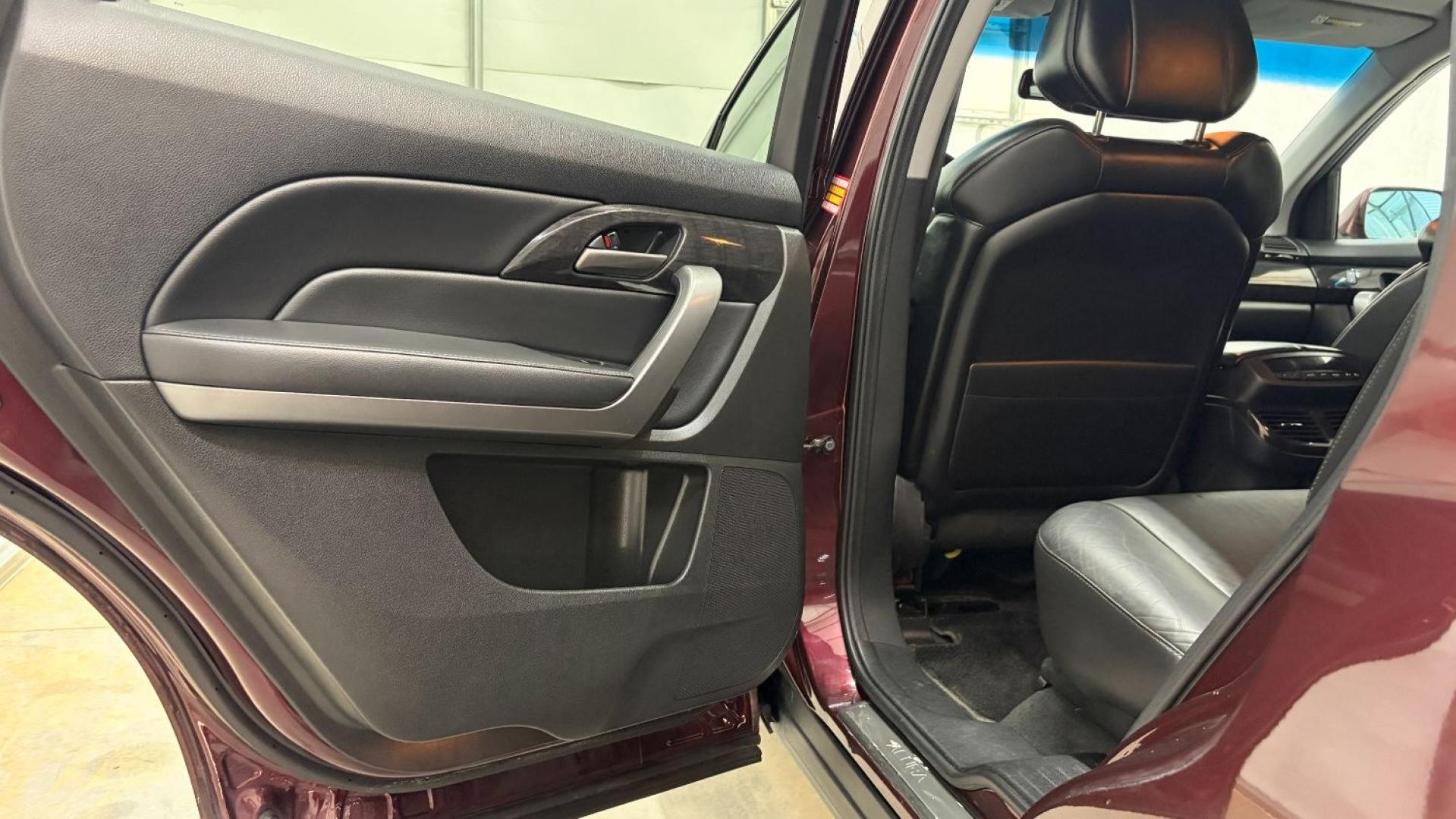 2009 Maroon Acura MDX Base (2HNYD282X9H) with an 3.7L V6 SOHC 24V engine, 5-Speed Automatic transmission, located at 1806 Veterans Memorial Hwy SW, Austell, GA, 30168, (770) 944-9558, 33.817959, -84.606987- Photo#13