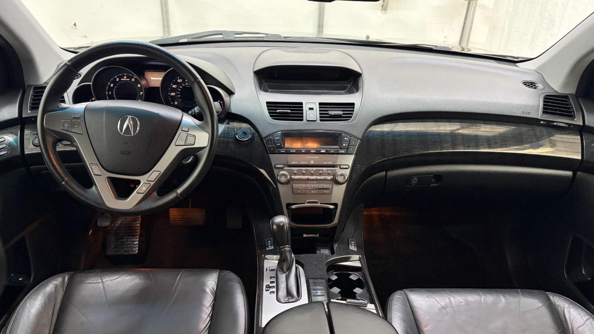 2009 Maroon Acura MDX Base (2HNYD282X9H) with an 3.7L V6 SOHC 24V engine, 5-Speed Automatic transmission, located at 1806 Veterans Memorial Hwy SW, Austell, GA, 30168, (770) 944-9558, 33.817959, -84.606987- Photo#15