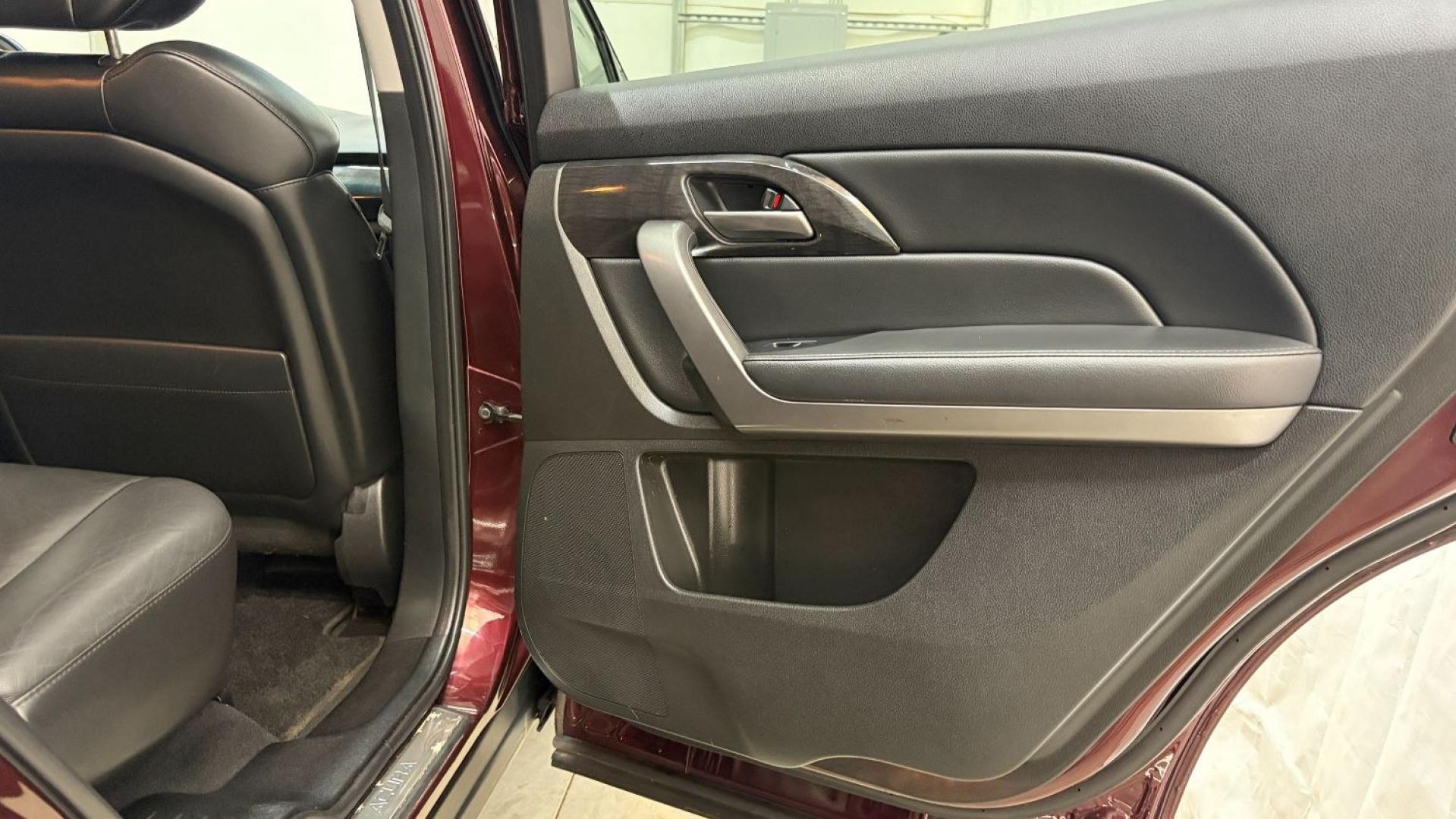 2009 Maroon Acura MDX Base (2HNYD282X9H) with an 3.7L V6 SOHC 24V engine, 5-Speed Automatic transmission, located at 1806 Veterans Memorial Hwy SW, Austell, GA, 30168, (770) 944-9558, 33.817959, -84.606987- Photo#17