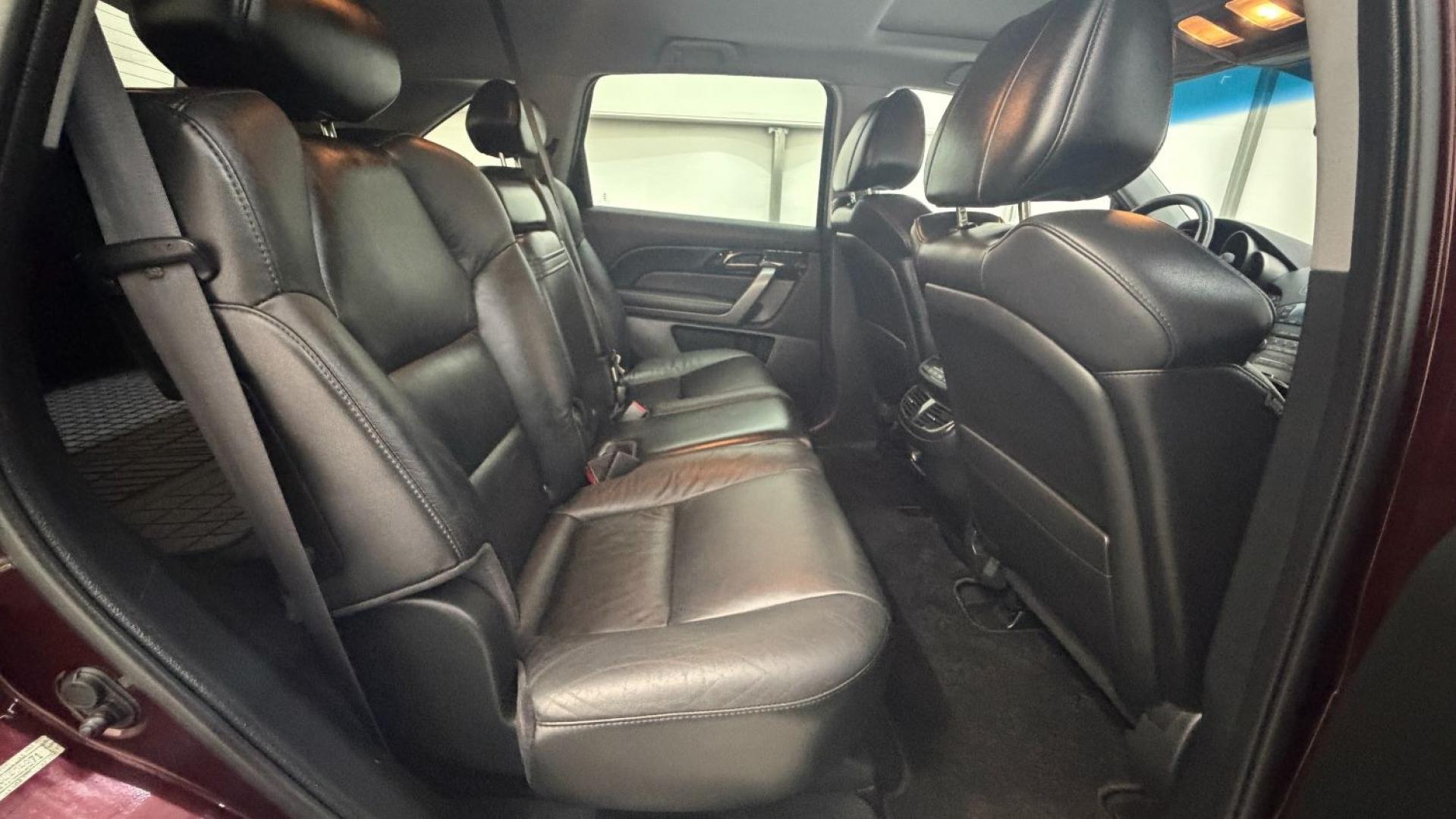2009 Maroon Acura MDX Base (2HNYD282X9H) with an 3.7L V6 SOHC 24V engine, 5-Speed Automatic transmission, located at 1806 Veterans Memorial Hwy SW, Austell, GA, 30168, (770) 944-9558, 33.817959, -84.606987- Photo#18