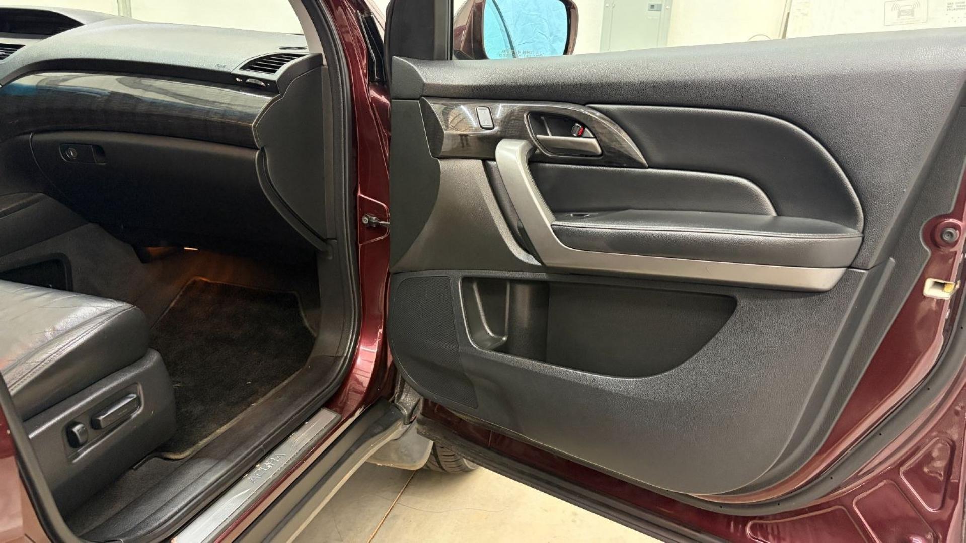 2009 Maroon Acura MDX Base (2HNYD282X9H) with an 3.7L V6 SOHC 24V engine, 5-Speed Automatic transmission, located at 1806 Veterans Memorial Hwy SW, Austell, GA, 30168, (770) 944-9558, 33.817959, -84.606987- Photo#19