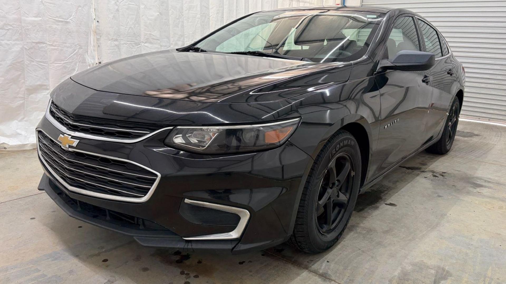 2016 Black Chevrolet Malibu LS (1G1ZB5ST9GF) with an 1.5L L4 DOHC 16V engine, 6-Speed Automatic transmission, located at 1806 Veterans Memorial Hwy SW, Austell, GA, 30168, (770) 944-9558, 33.817959, -84.606987 - Photo#0