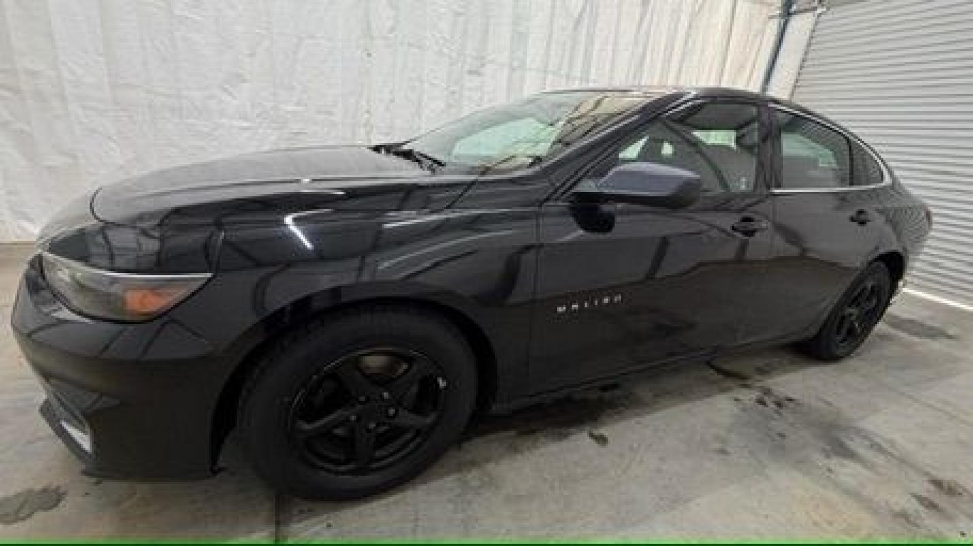 2016 Black Chevrolet Malibu LS (1G1ZB5ST9GF) with an 1.5L L4 DOHC 16V engine, 6-Speed Automatic transmission, located at 1806 Veterans Memorial Hwy SW, Austell, GA, 30168, (770) 944-9558, 33.817959, -84.606987 - Photo#1