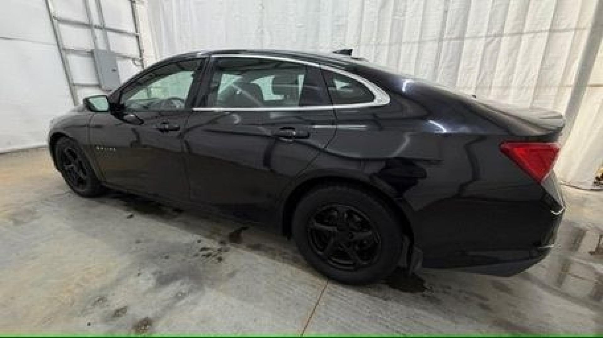 2016 Black Chevrolet Malibu LS (1G1ZB5ST9GF) with an 1.5L L4 DOHC 16V engine, 6-Speed Automatic transmission, located at 1806 Veterans Memorial Hwy SW, Austell, GA, 30168, (770) 944-9558, 33.817959, -84.606987 - Photo#2