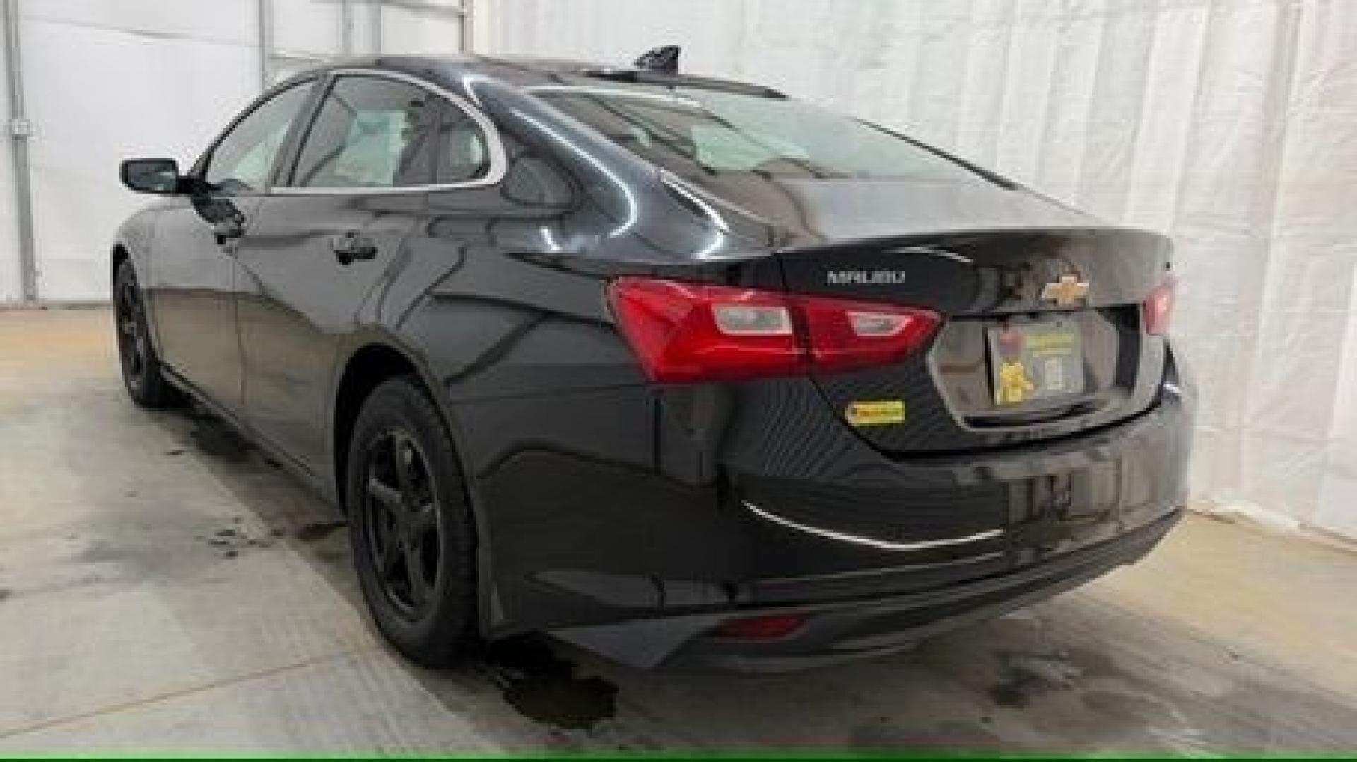 2016 Black Chevrolet Malibu LS (1G1ZB5ST9GF) with an 1.5L L4 DOHC 16V engine, 6-Speed Automatic transmission, located at 1806 Veterans Memorial Hwy SW, Austell, GA, 30168, (770) 944-9558, 33.817959, -84.606987 - Photo#3