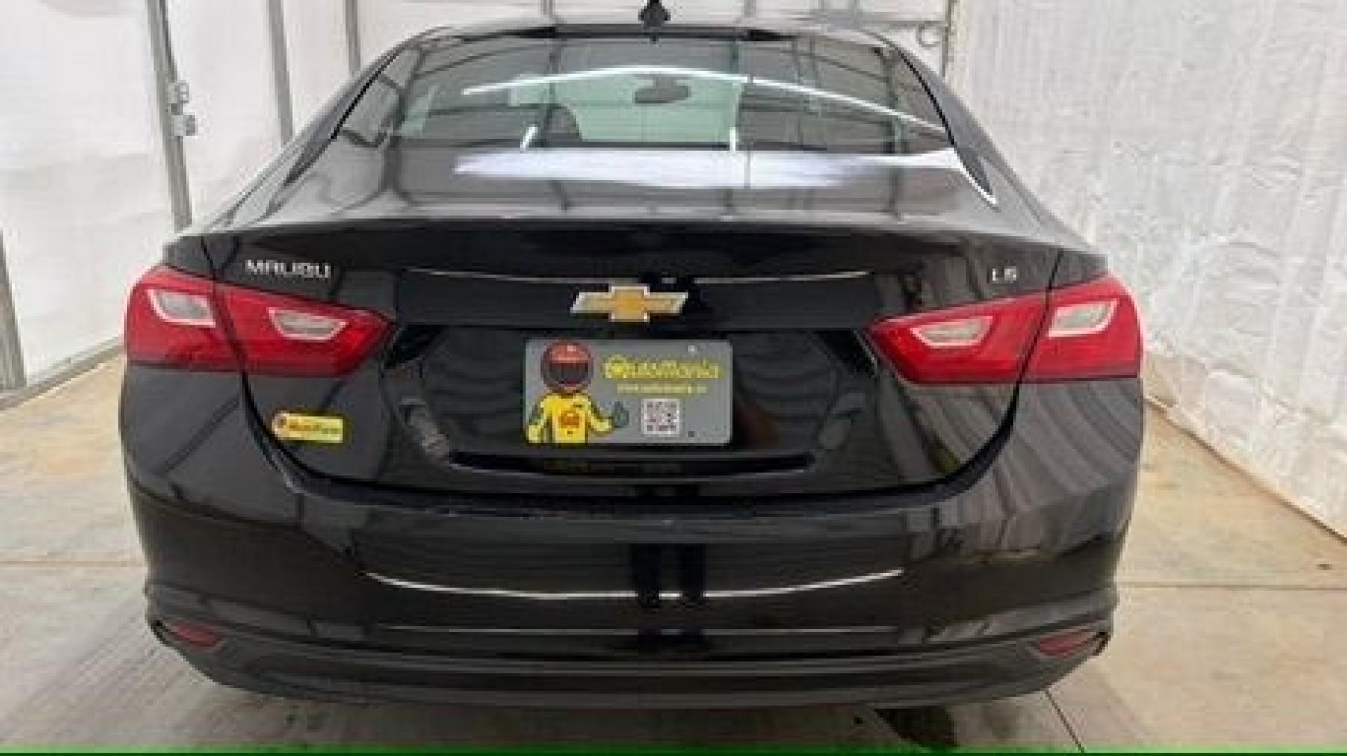2016 Black Chevrolet Malibu LS (1G1ZB5ST9GF) with an 1.5L L4 DOHC 16V engine, 6-Speed Automatic transmission, located at 1806 Veterans Memorial Hwy SW, Austell, GA, 30168, (770) 944-9558, 33.817959, -84.606987 - Photo#4