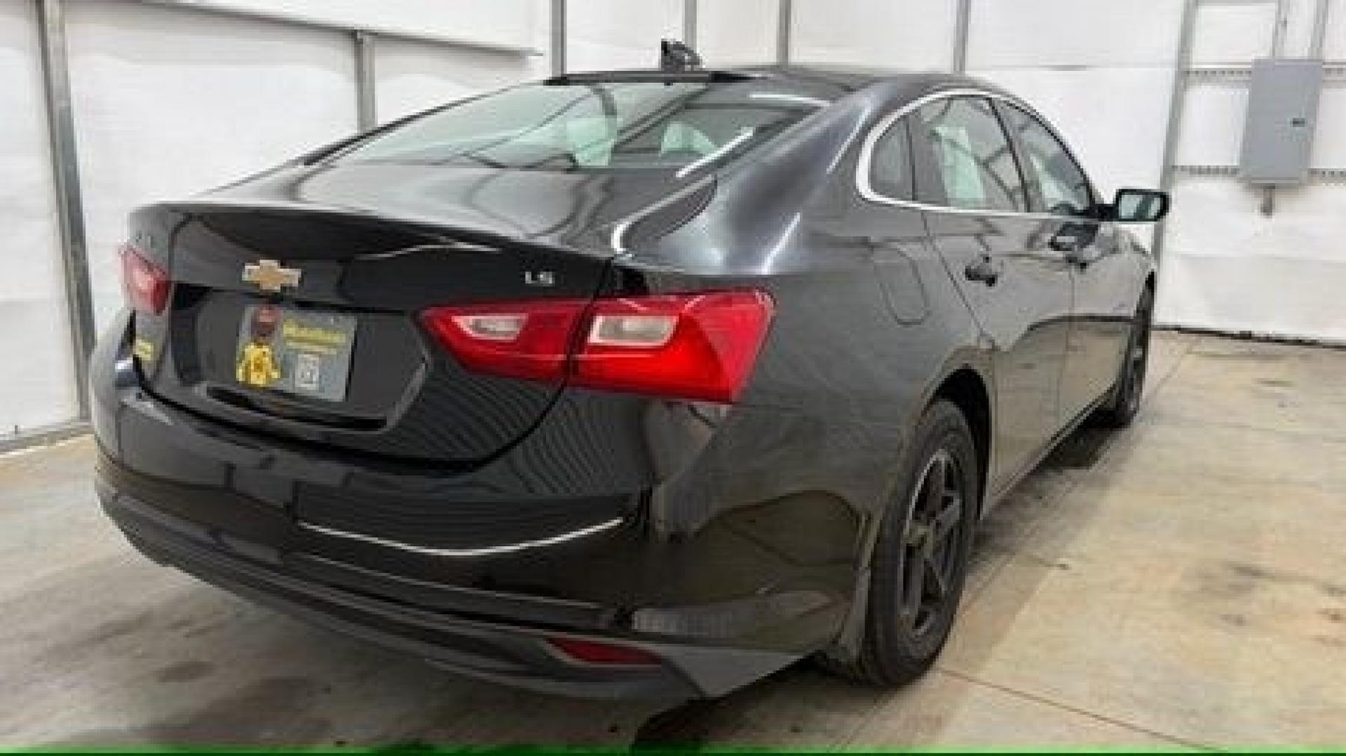 2016 Black Chevrolet Malibu LS (1G1ZB5ST9GF) with an 1.5L L4 DOHC 16V engine, 6-Speed Automatic transmission, located at 1806 Veterans Memorial Hwy SW, Austell, GA, 30168, (770) 944-9558, 33.817959, -84.606987 - Photo#5