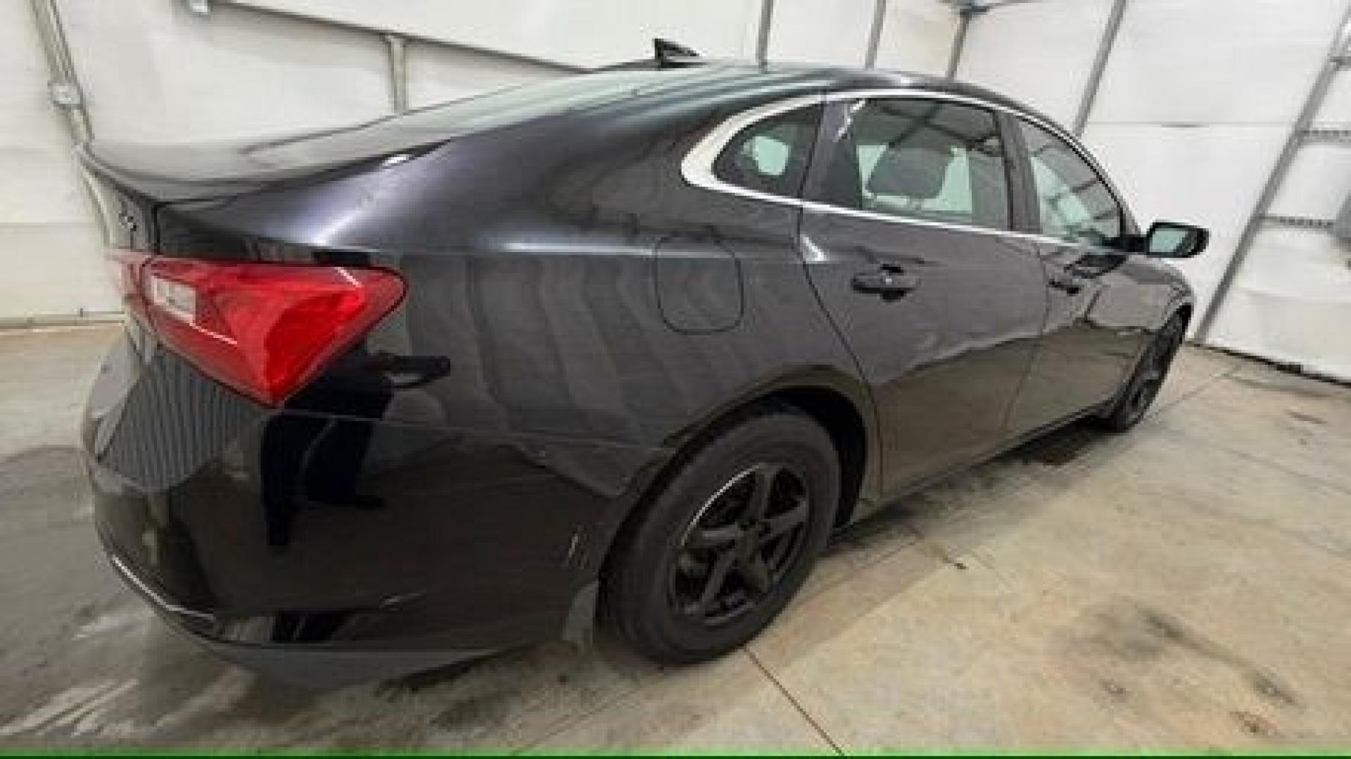 2016 Black Chevrolet Malibu LS (1G1ZB5ST9GF) with an 1.5L L4 DOHC 16V engine, 6-Speed Automatic transmission, located at 1806 Veterans Memorial Hwy SW, Austell, GA, 30168, (770) 944-9558, 33.817959, -84.606987 - Photo#6