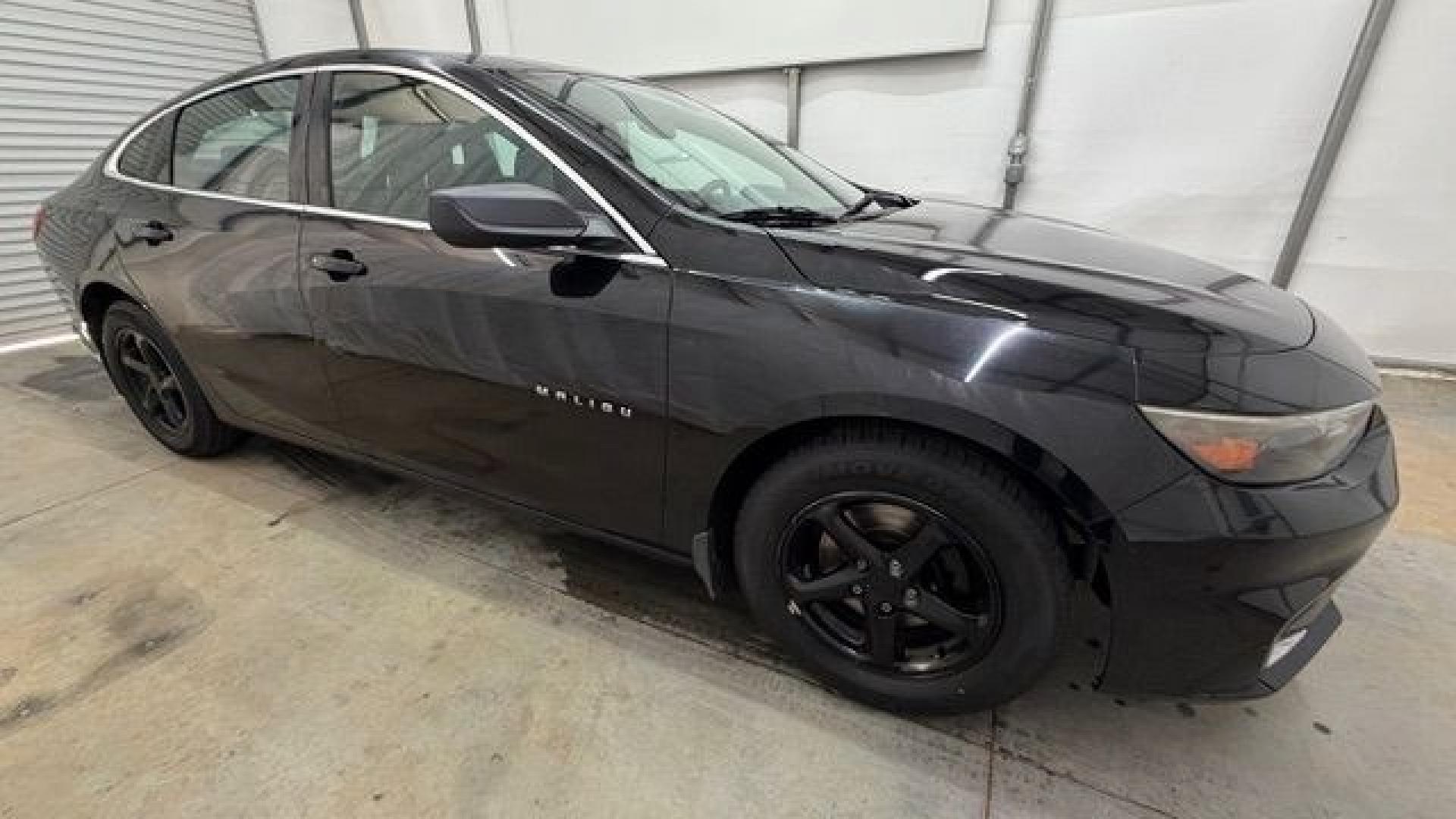 2016 Black Chevrolet Malibu LS (1G1ZB5ST9GF) with an 1.5L L4 DOHC 16V engine, 6-Speed Automatic transmission, located at 1806 Veterans Memorial Hwy SW, Austell, GA, 30168, (770) 944-9558, 33.817959, -84.606987 - Photo#7