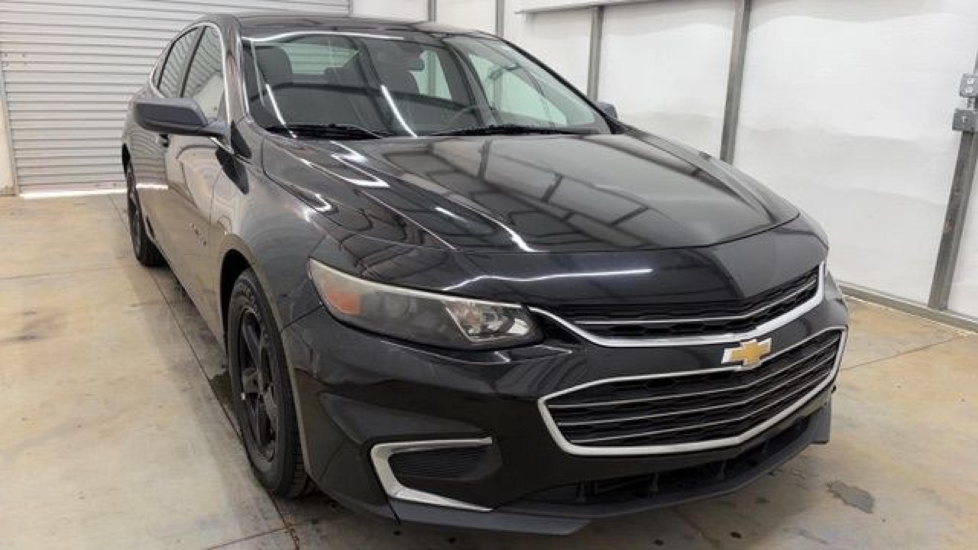 2016 Black Chevrolet Malibu LS (1G1ZB5ST9GF) with an 1.5L L4 DOHC 16V engine, 6-Speed Automatic transmission, located at 1806 Veterans Memorial Hwy SW, Austell, GA, 30168, (770) 944-9558, 33.817959, -84.606987 - Photo#8