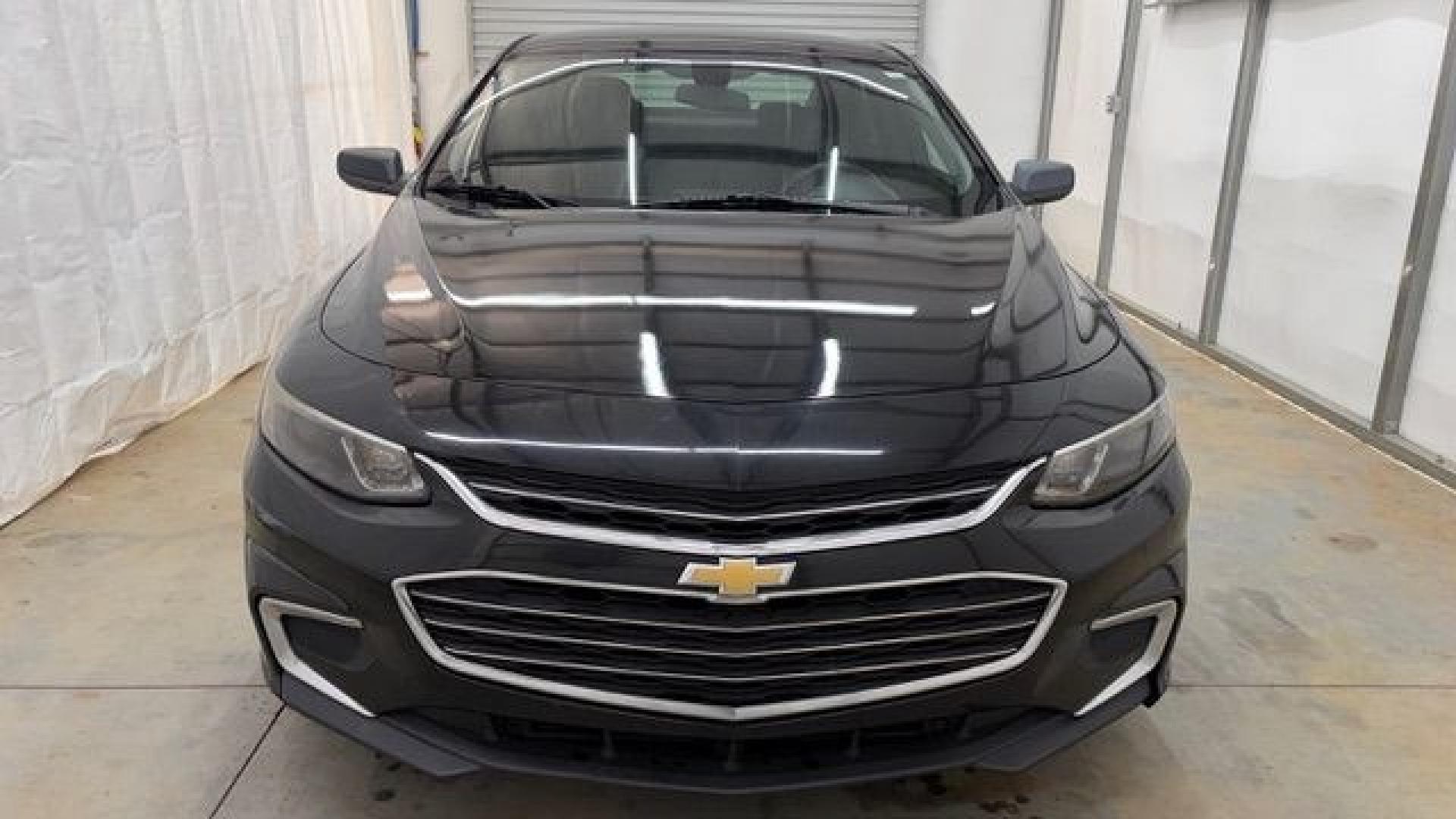2016 Black Chevrolet Malibu LS (1G1ZB5ST9GF) with an 1.5L L4 DOHC 16V engine, 6-Speed Automatic transmission, located at 1806 Veterans Memorial Hwy SW, Austell, GA, 30168, (770) 944-9558, 33.817959, -84.606987 - Photo#9