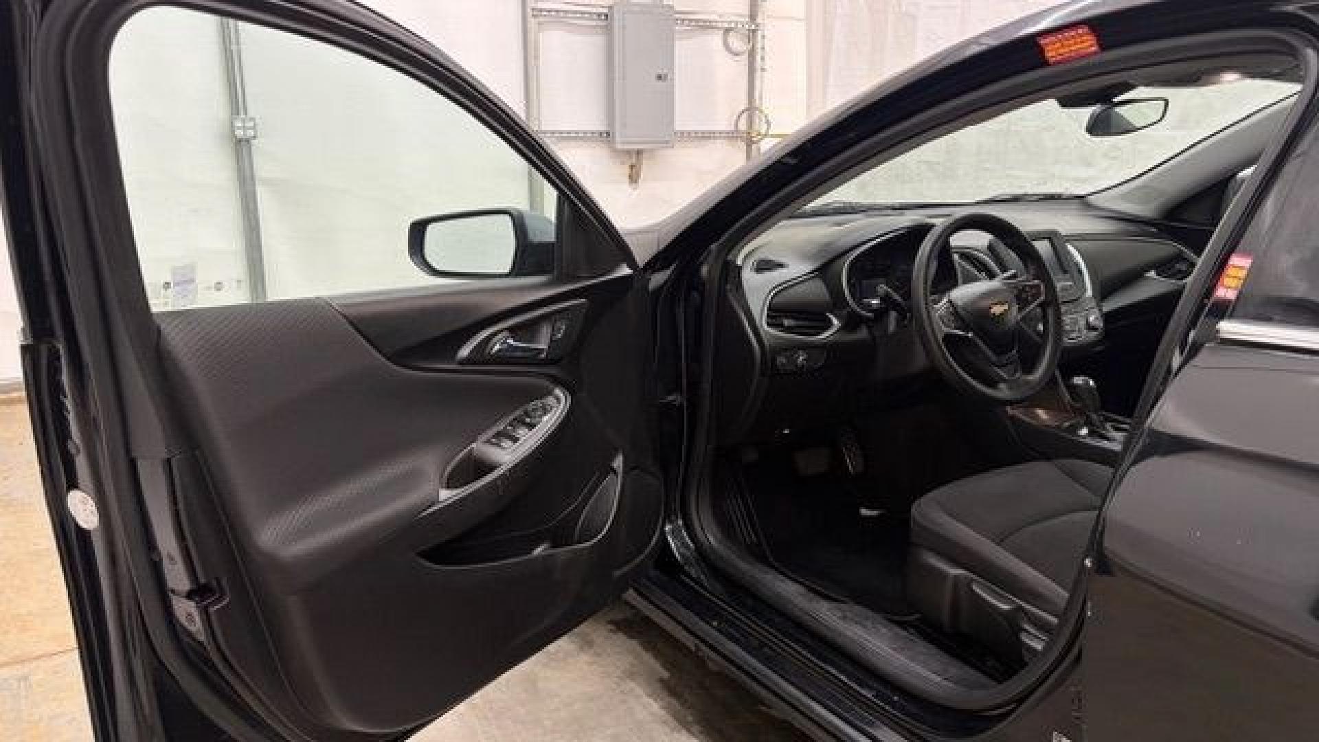 2016 Black Chevrolet Malibu LS (1G1ZB5ST9GF) with an 1.5L L4 DOHC 16V engine, 6-Speed Automatic transmission, located at 1806 Veterans Memorial Hwy SW, Austell, GA, 30168, (770) 944-9558, 33.817959, -84.606987 - Photo#10