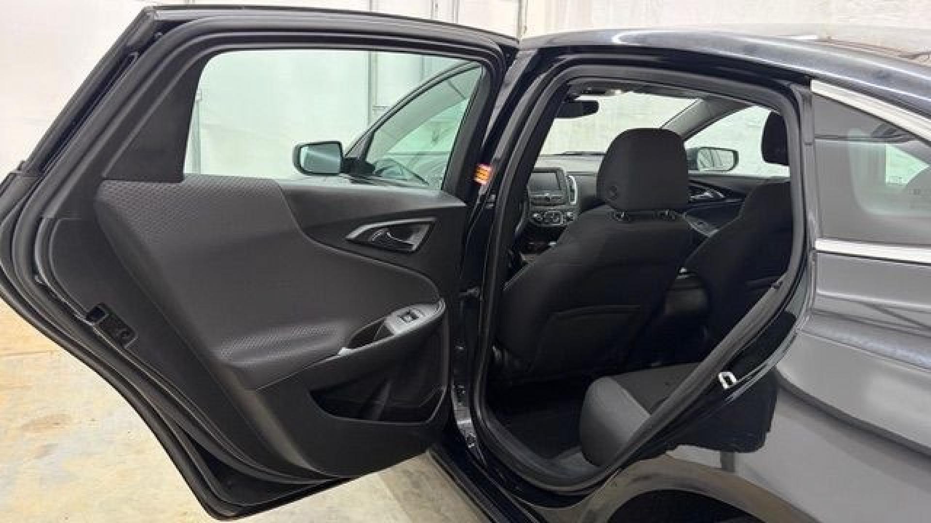 2016 Black Chevrolet Malibu LS (1G1ZB5ST9GF) with an 1.5L L4 DOHC 16V engine, 6-Speed Automatic transmission, located at 1806 Veterans Memorial Hwy SW, Austell, GA, 30168, (770) 944-9558, 33.817959, -84.606987 - Photo#13