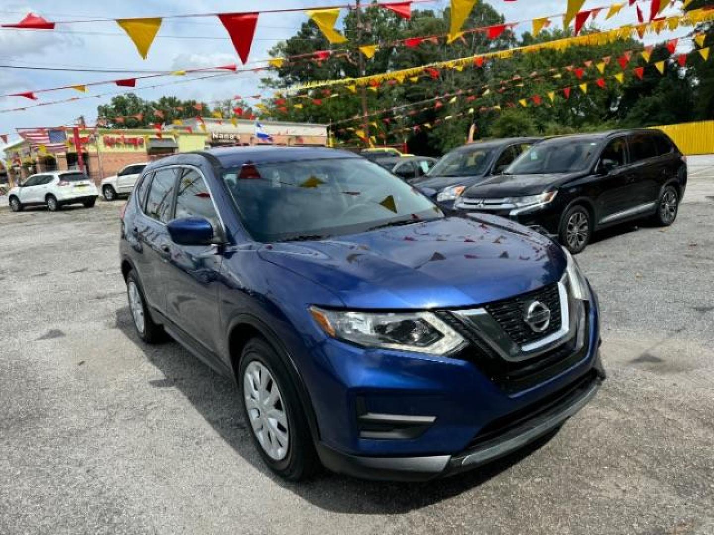 2017 Blue Nissan Rogue S 2WD (5N1AT2MT1HC) with an 2.5L L4 DOHC 16V engine, Continuously Variable Transmission transmission, located at 1806 Veterans Memorial Hwy SW, Austell, GA, 30168, (770) 944-9558, 33.817959, -84.606987 - Photo#6