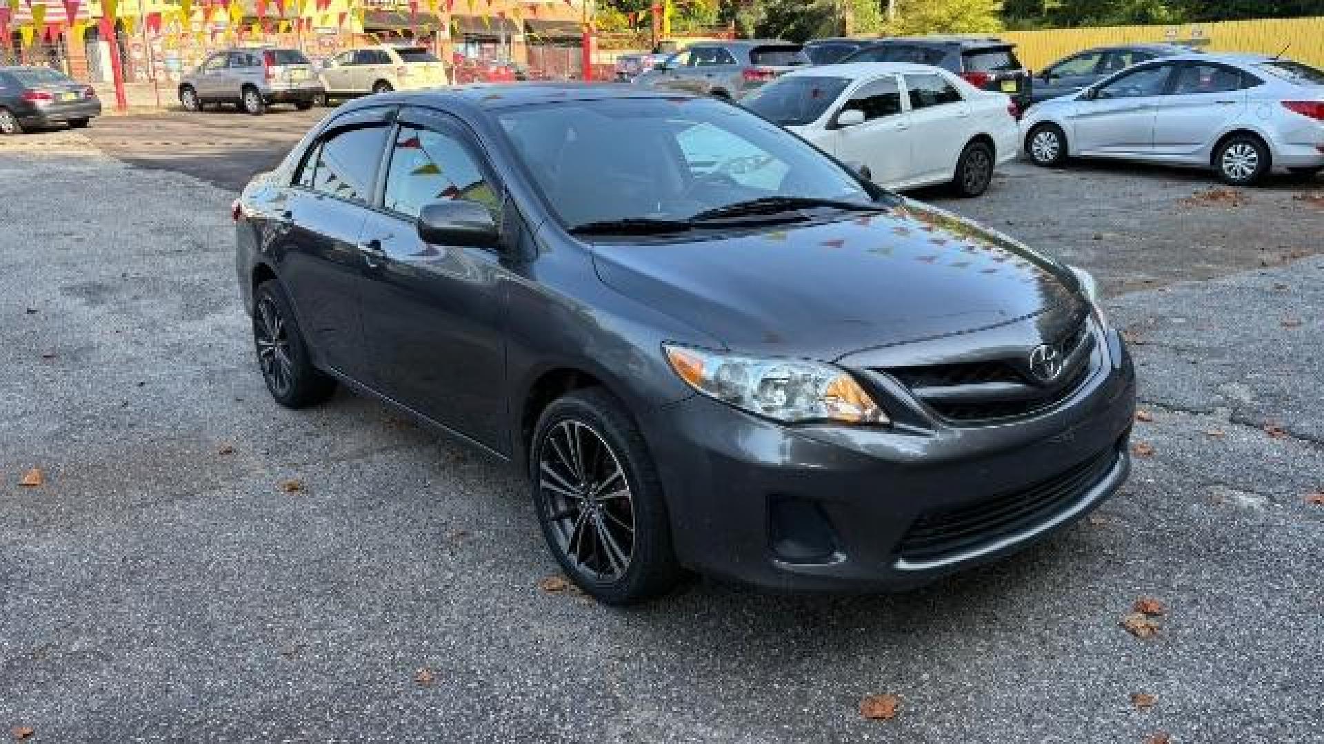 2012 Gray Toyota Corolla LE 4-Speed AT (5YFBU4EEXCP) with an 1.8L L4 DOHC 16V engine, 4-Speed Automatic transmission, located at 1806 Veterans Memorial Hwy SW, Austell, GA, 30168, (770) 944-9558, 33.817959, -84.606987 - Photo#2