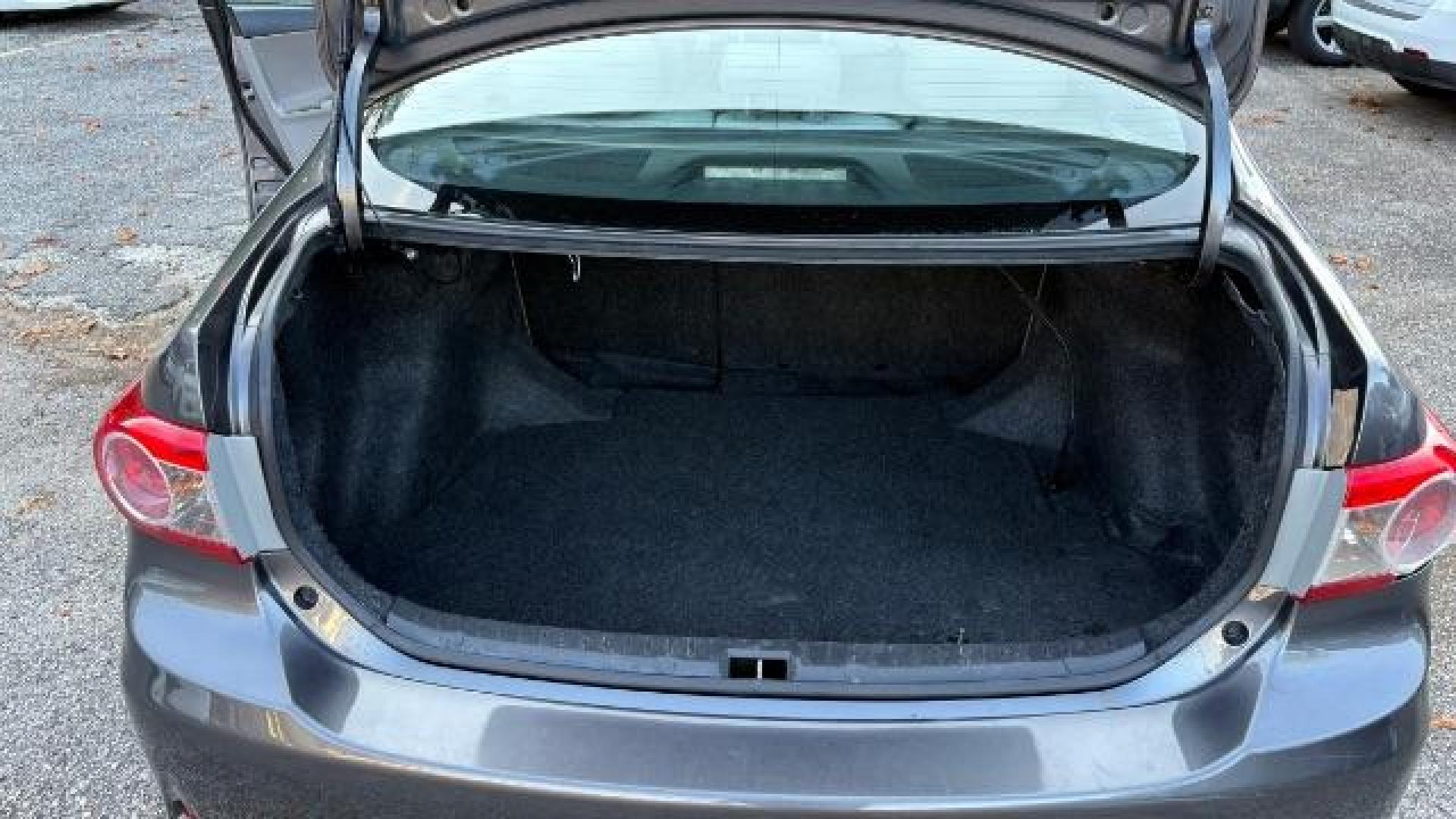 2012 Gray Toyota Corolla LE 4-Speed AT (5YFBU4EEXCP) with an 1.8L L4 DOHC 16V engine, 4-Speed Automatic transmission, located at 1806 Veterans Memorial Hwy SW, Austell, GA, 30168, (770) 944-9558, 33.817959, -84.606987 - Photo#9