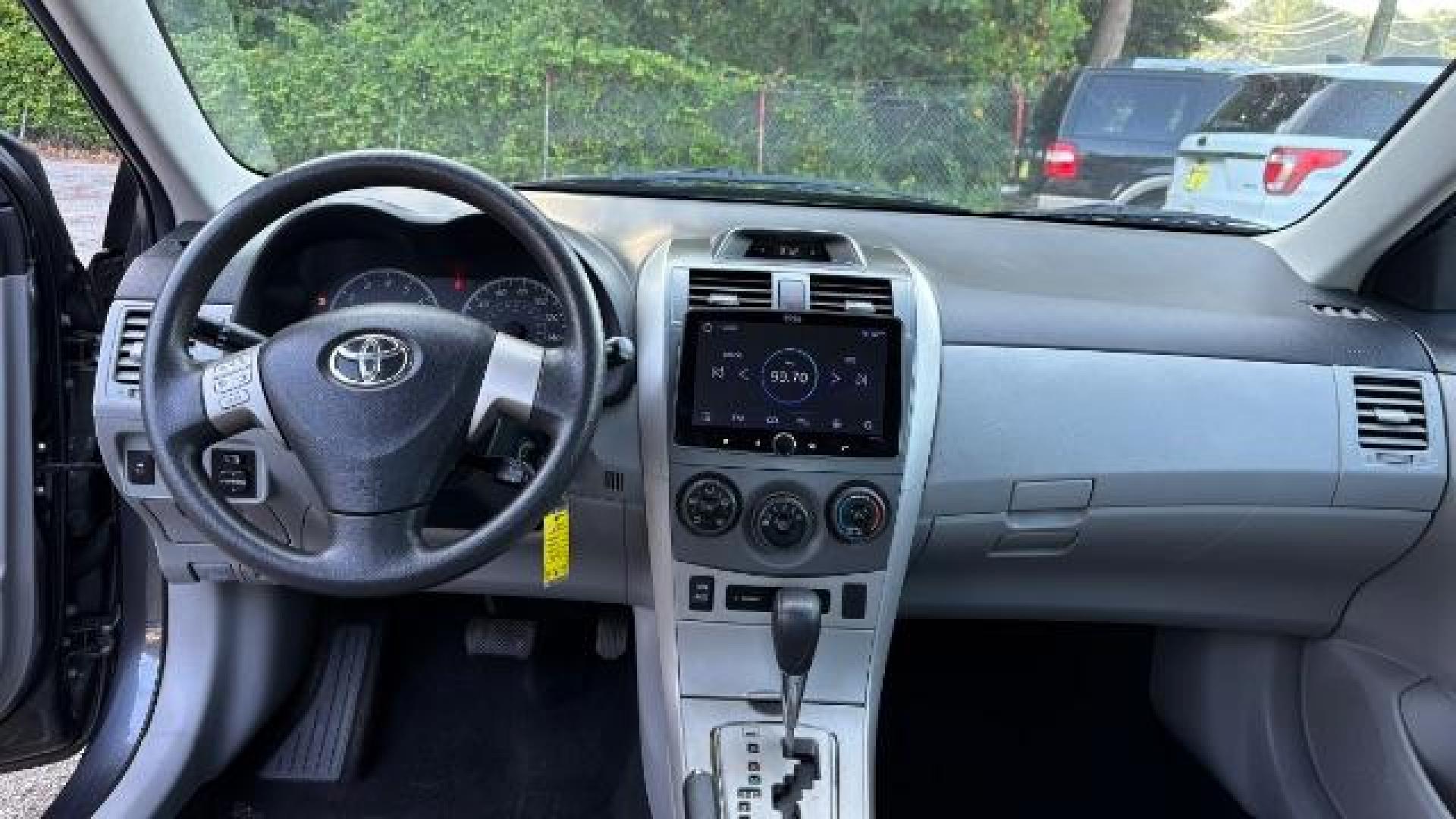 2012 Gray Toyota Corolla LE 4-Speed AT (5YFBU4EEXCP) with an 1.8L L4 DOHC 16V engine, 4-Speed Automatic transmission, located at 1806 Veterans Memorial Hwy SW, Austell, GA, 30168, (770) 944-9558, 33.817959, -84.606987 - Photo#11