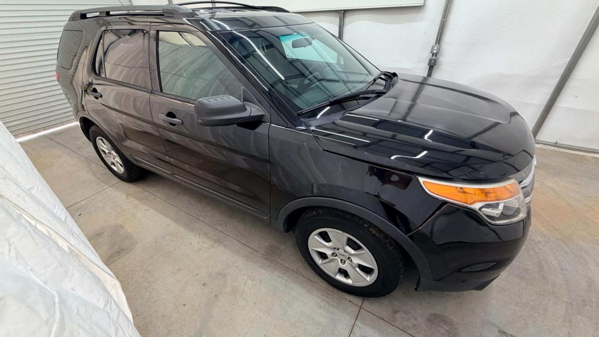 2014 Black Ford Explorer Base FWD (1FM5K7B87EG) with an 3.5L V6 DOHC 24V engine, 6-Speed Automatic transmission, located at 1806 Veterans Memorial Hwy SW, Austell, GA, 30168, (770) 944-9558, 33.817959, -84.606987- Photo#7