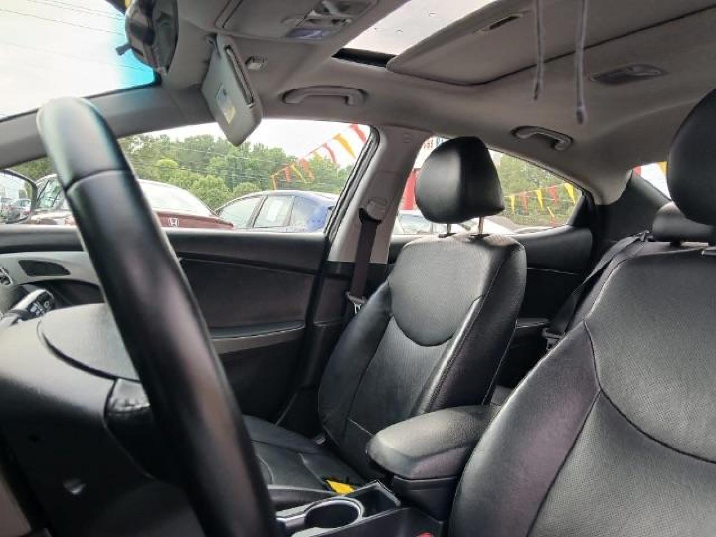 2016 Black Hyundai Elantra SE 6AT (KMHDH4AE4GU) with an 1.8L L4 DOHC 16V engine, 6-Speed Automatic transmission, located at 1806 Veterans Memorial Hwy SW, Austell, GA, 30168, (770) 944-9558, 33.817959, -84.606987 - Photo#17