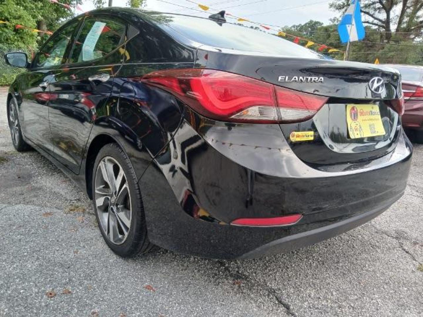2016 Black Hyundai Elantra SE 6AT (KMHDH4AE4GU) with an 1.8L L4 DOHC 16V engine, 6-Speed Automatic transmission, located at 1806 Veterans Memorial Hwy SW, Austell, GA, 30168, (770) 944-9558, 33.817959, -84.606987 - Photo#2