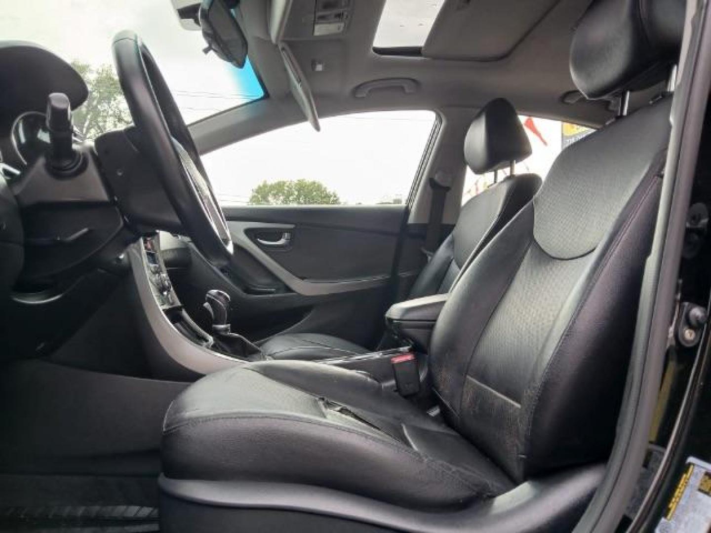 2016 Black Hyundai Elantra SE 6AT (KMHDH4AE4GU) with an 1.8L L4 DOHC 16V engine, 6-Speed Automatic transmission, located at 1806 Veterans Memorial Hwy SW, Austell, GA, 30168, (770) 944-9558, 33.817959, -84.606987 - Photo#5
