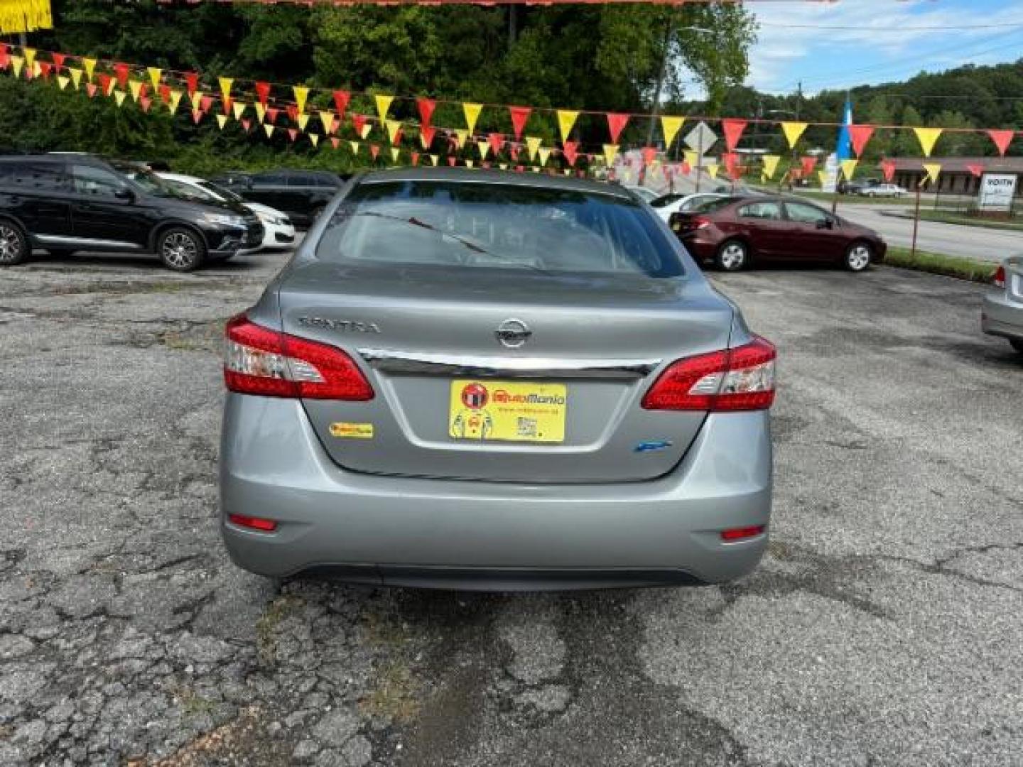 2014 Gray Nissan Sentra SEDAN 4-DR (3N1AB7AP2EL) with an 1.8L L4 SFI DOHC 16V engine, Continuously Variable Transmission transmission, located at 1806 Veterans Memorial Hwy SW, Austell, GA, 30168, (770) 944-9558, 33.817959, -84.606987 - Photo#4